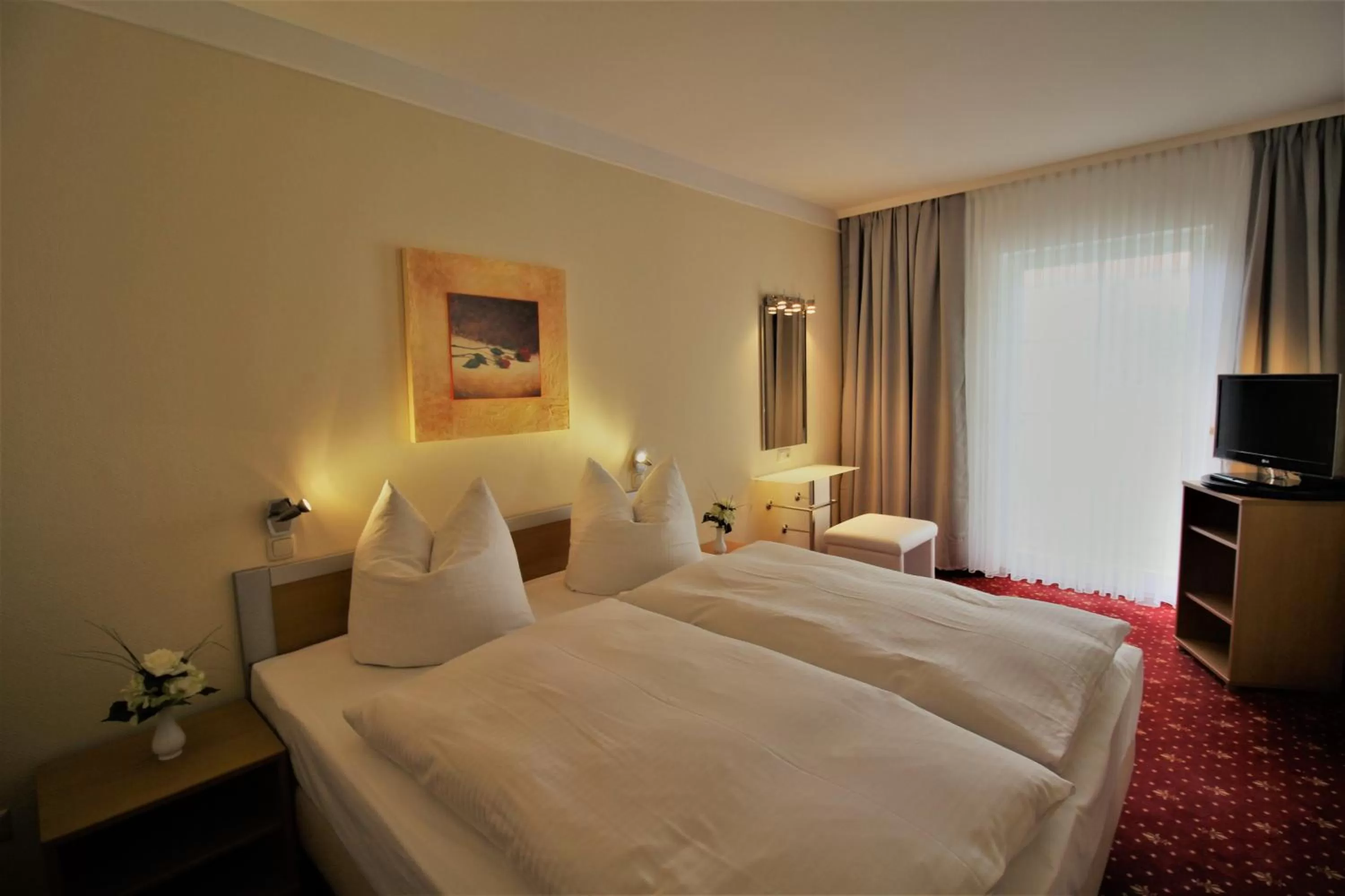 Photo of the whole room, Bed in Parkhotel Klüschenberg