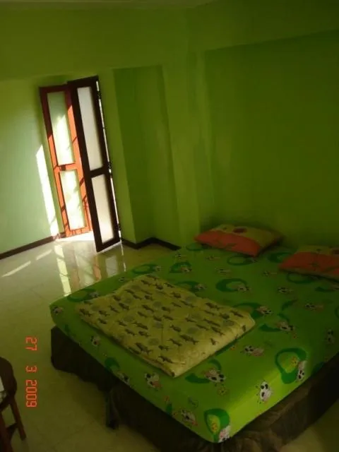 Bed in Kaset Guesthouse