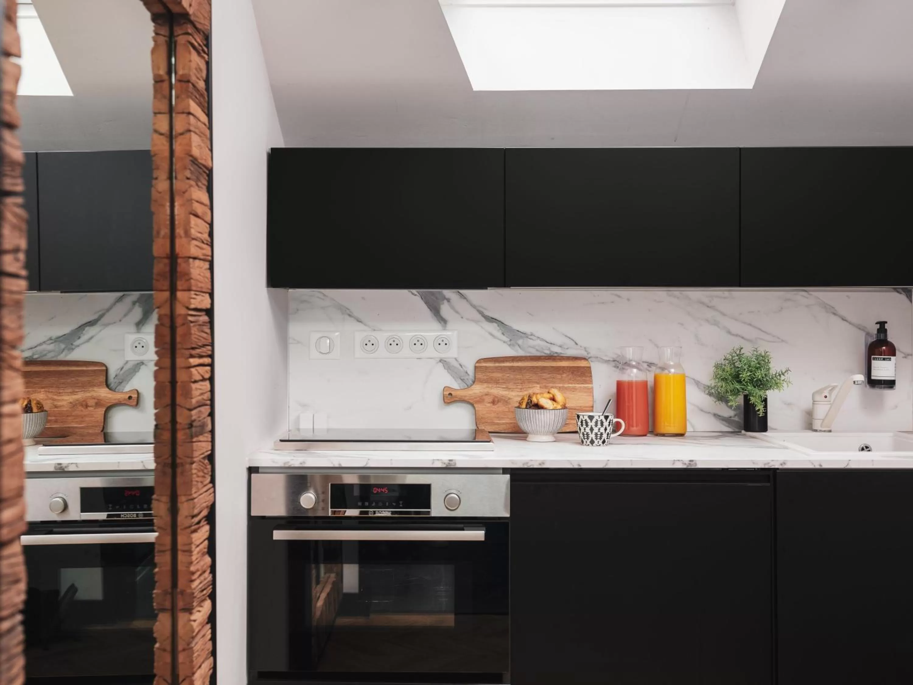 Kitchen or kitchenette in Maisons du Monde Hotel & Suites - Nantes