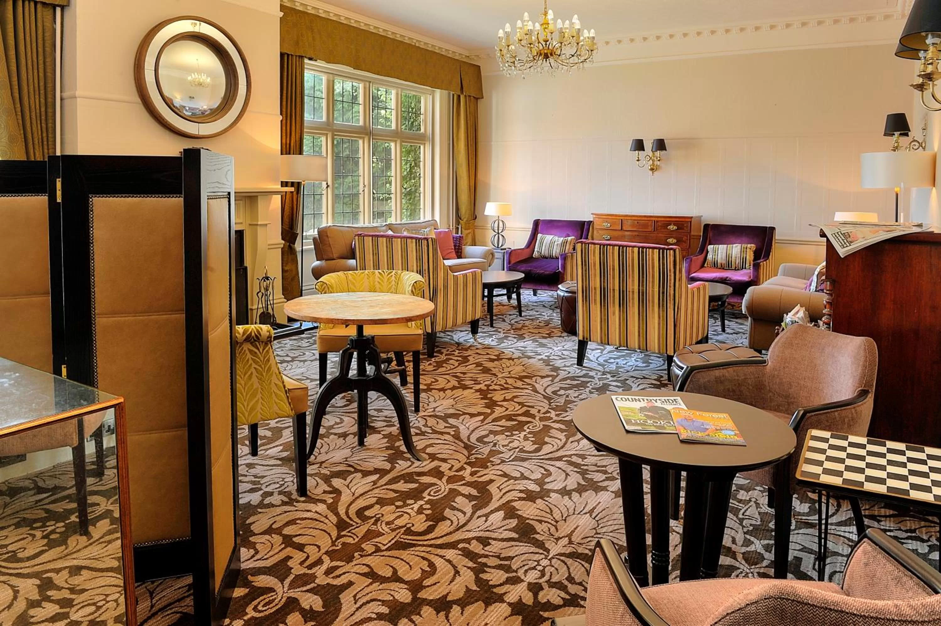 Communal lounge/ TV room in The Crown Manor House Hotel