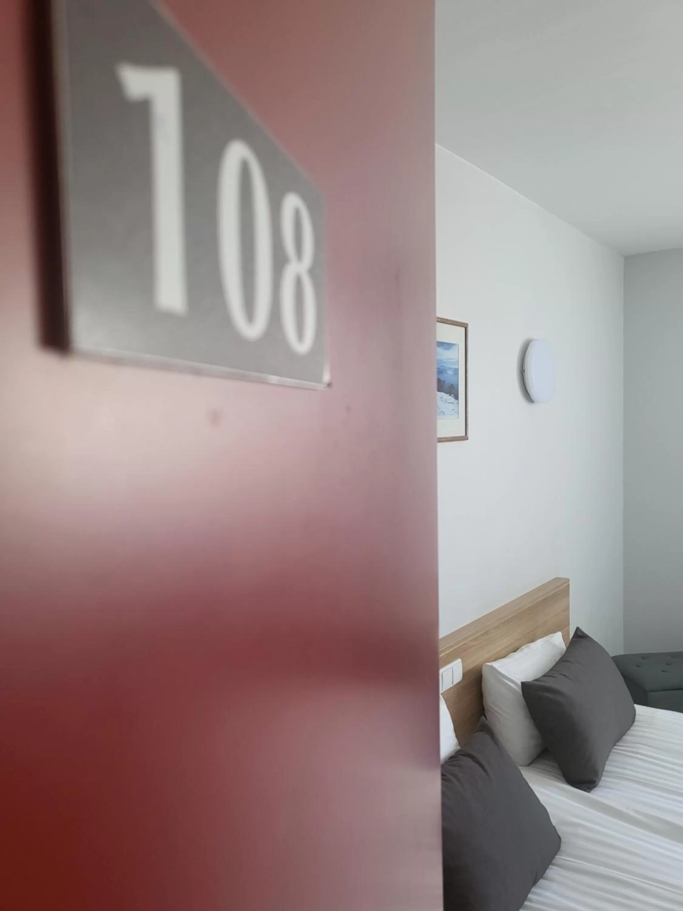 Text overlay, Bed in Green Vilnius Hotel