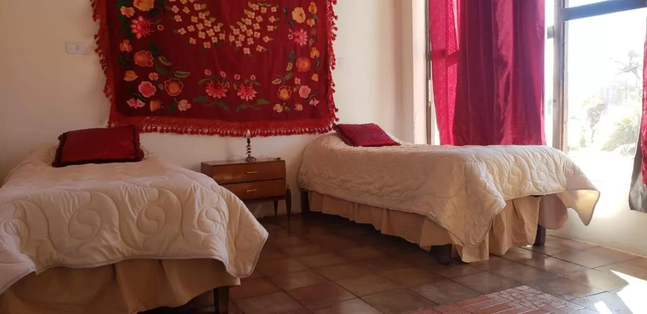 Bed in Hotel Hacienda Casa Blanca