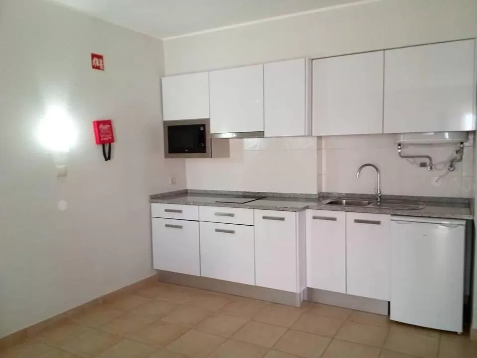 Kitchen or kitchenette in Albufeira Jardim by Umbral
