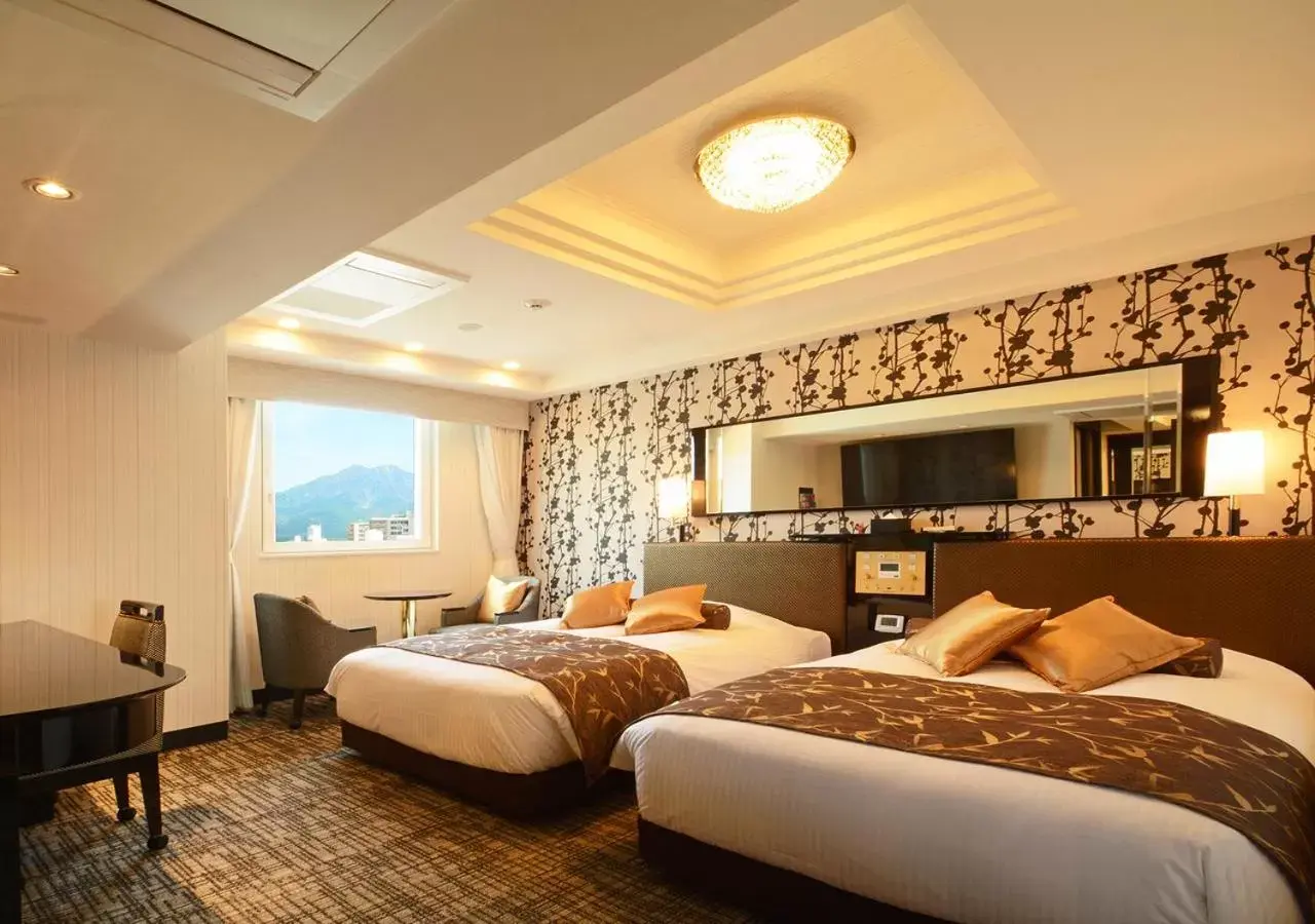 Bed in APA Hotel Kagoshima Tenmonkan