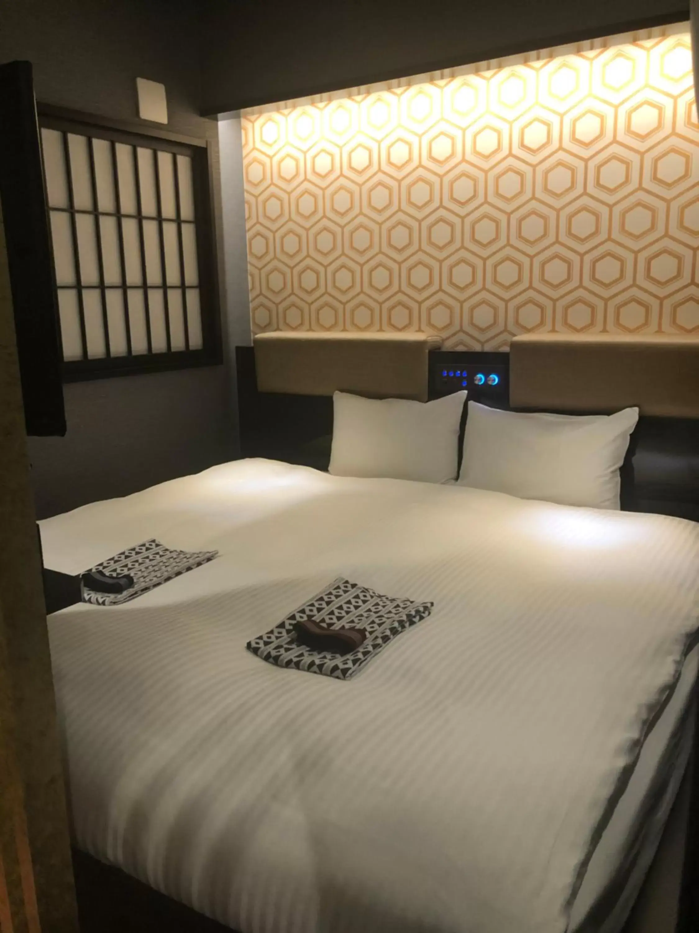 Bed in cotoha Hotel Okachimachi