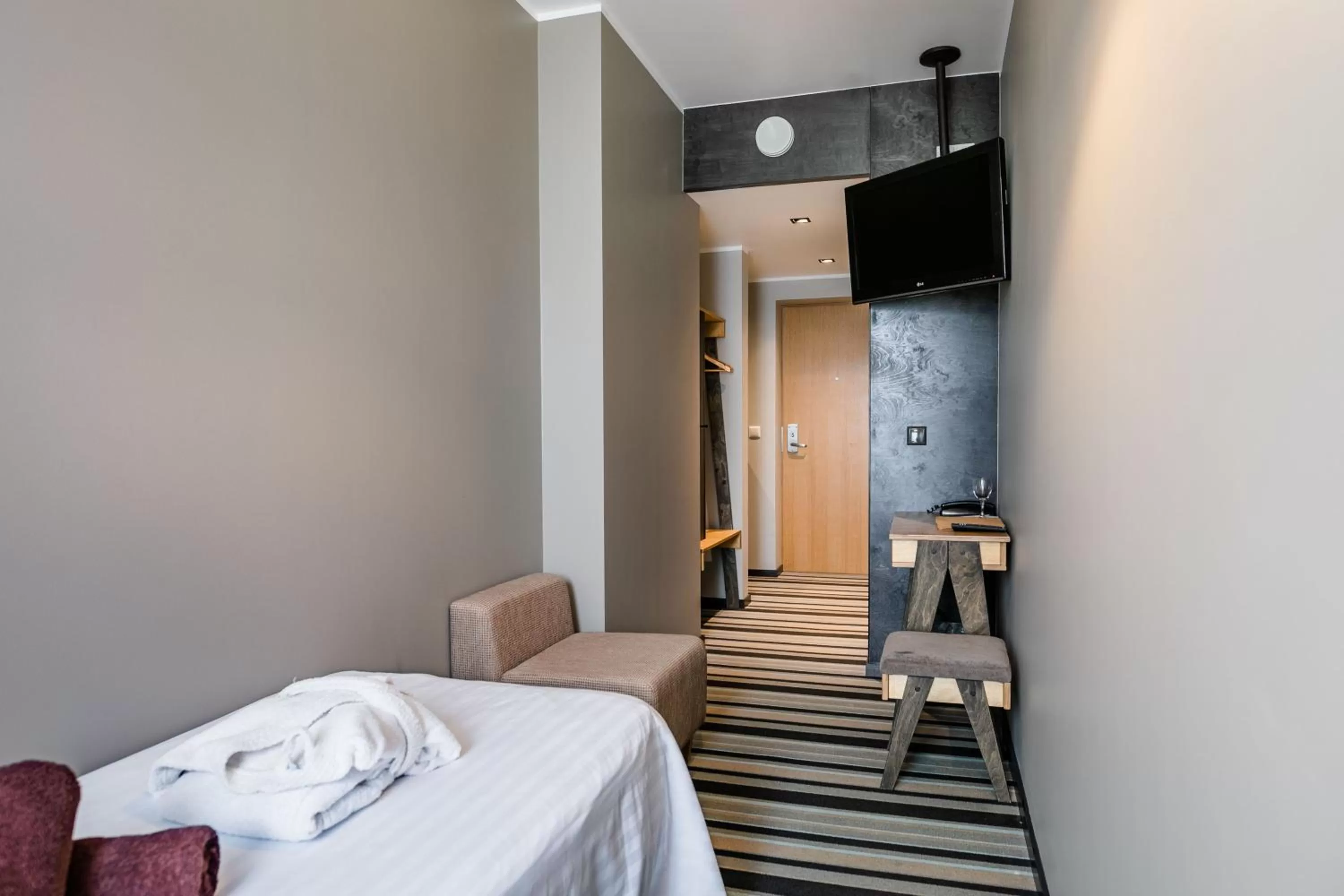 Bed in Johan Design & SPA Hotel