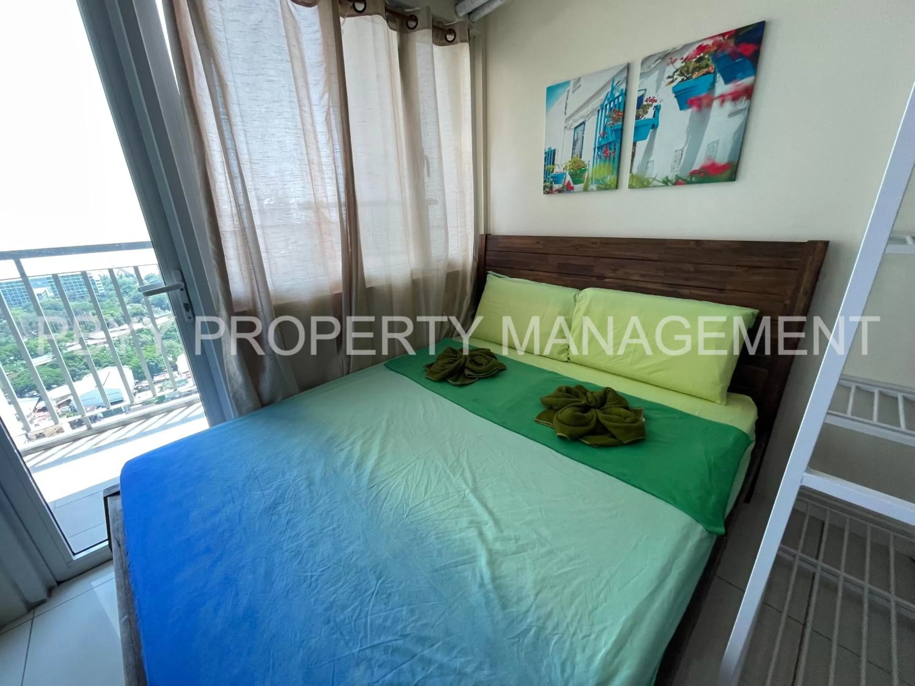 Bed in Green Residences Stays by PBYY