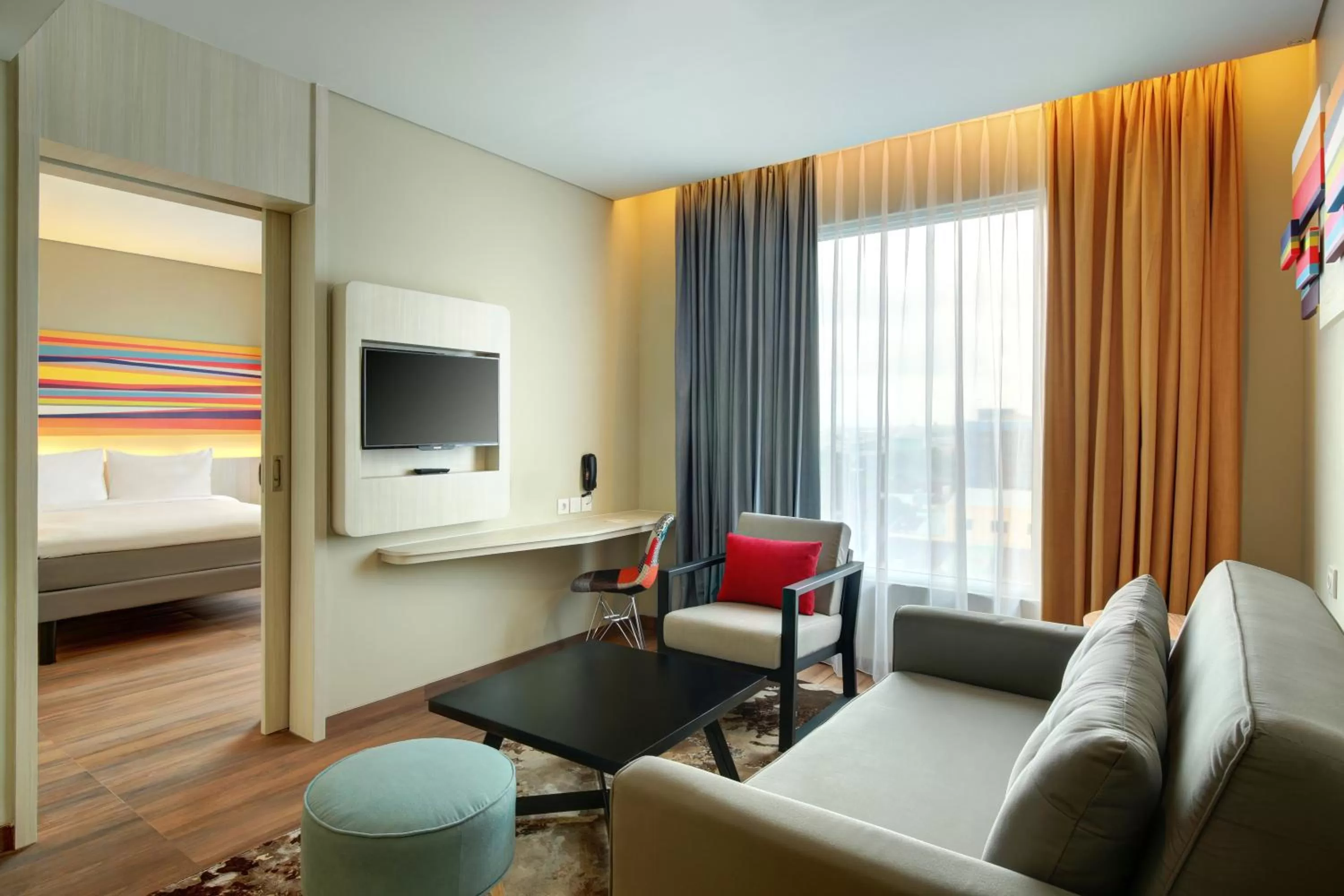 Living room, Bed in Ibis Styles Makassar Sam Ratulangi