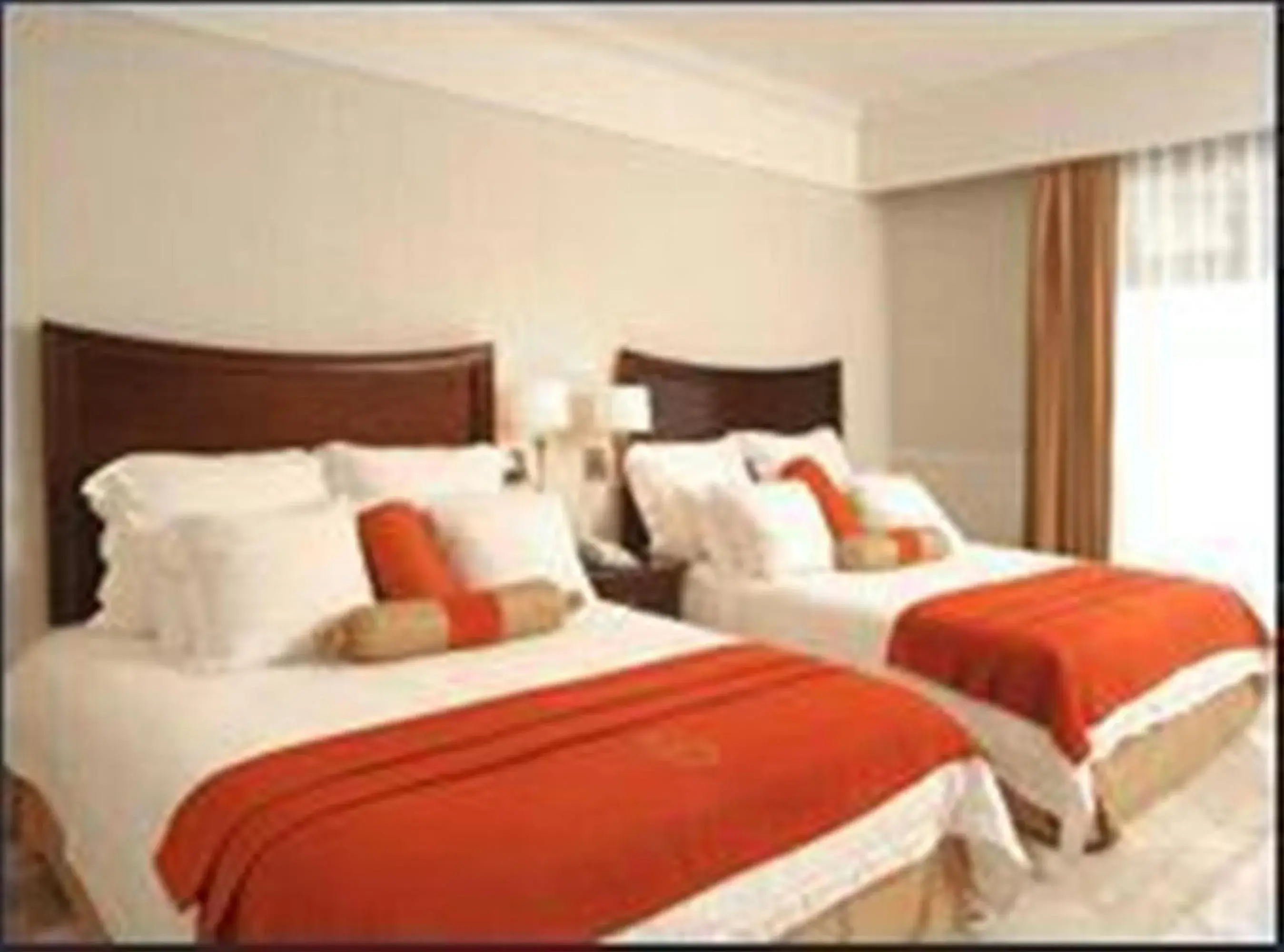Bed in Hacienda Real del Caribe Hotel