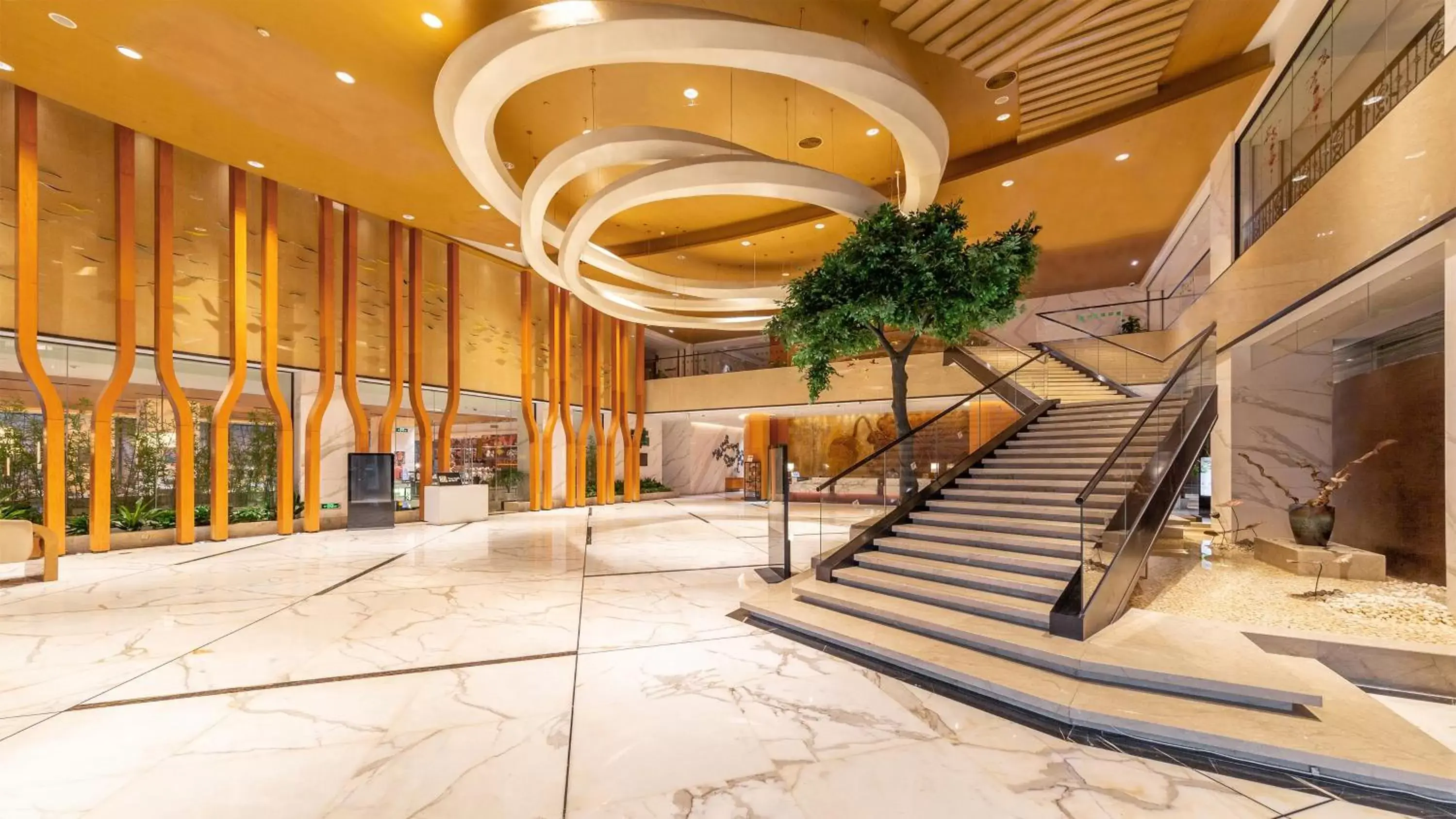 Lobby or reception in Holiday Inn Nanjing Xuanwu Lake by IHG Lobby or reception in Holiday Inn Nanjing Xuanwu Lake by IHG