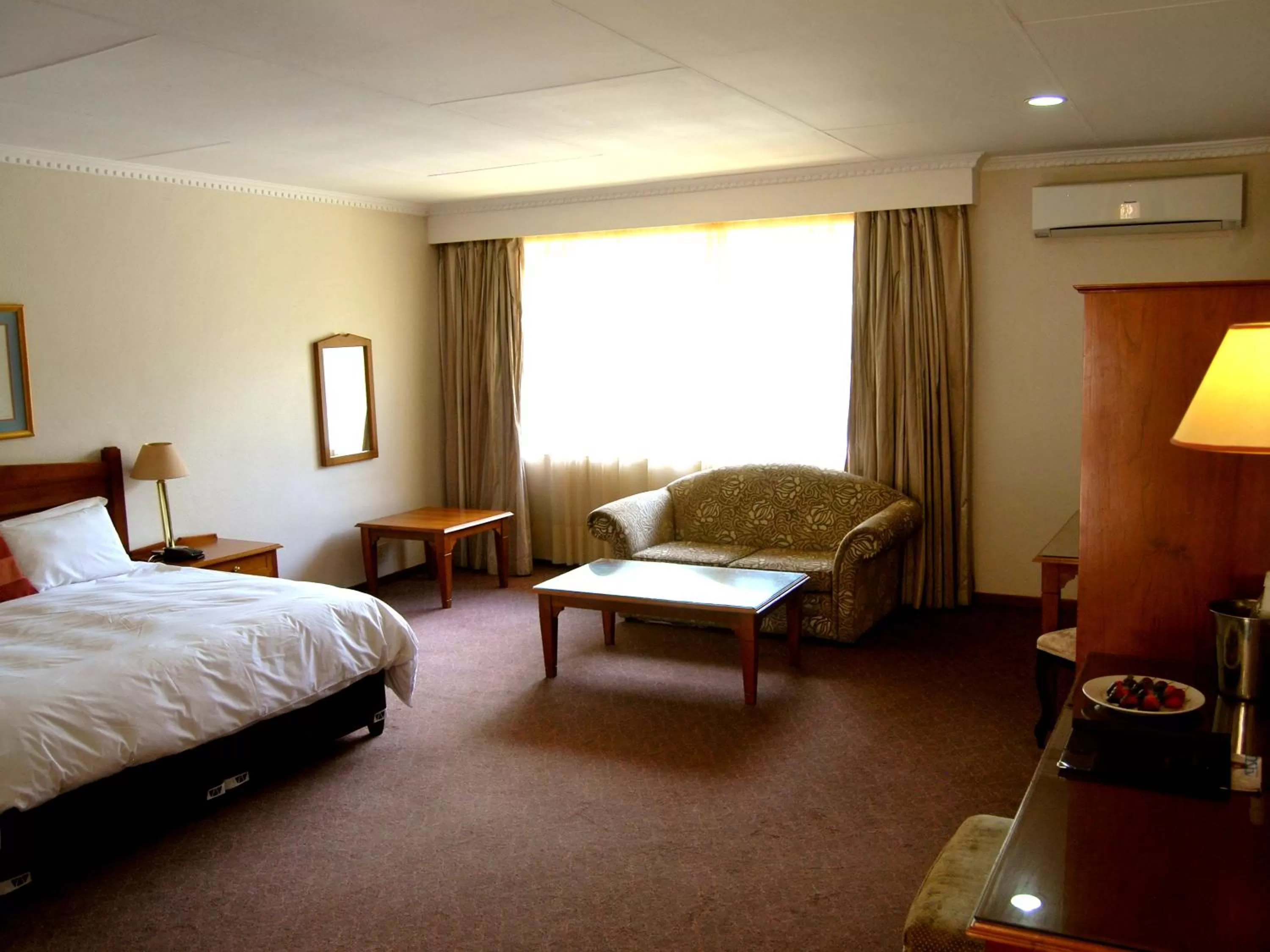 Photo of the whole room, Bed in Safari Hotel & Convention Centre