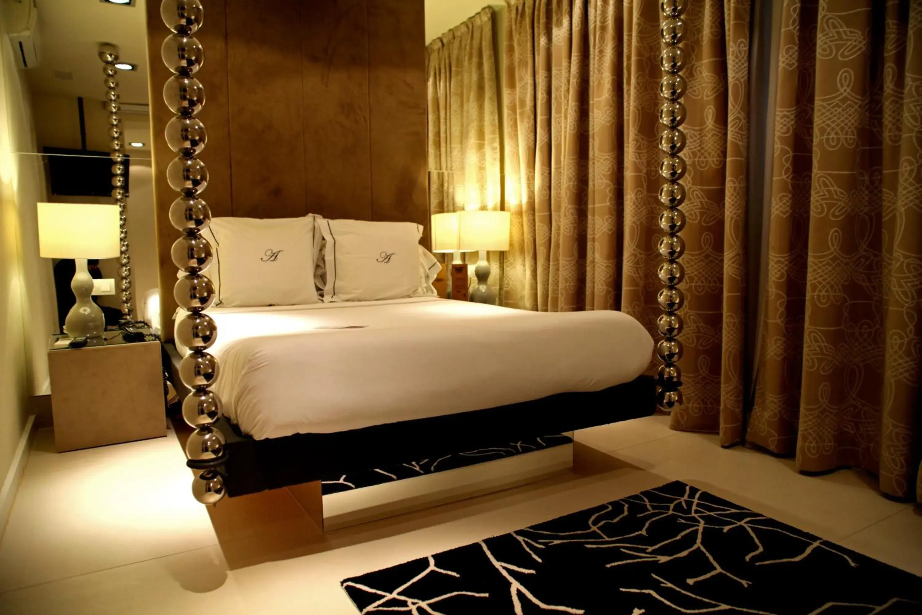 Bed in Abalú Small Luxury & Design Boutique Hotel