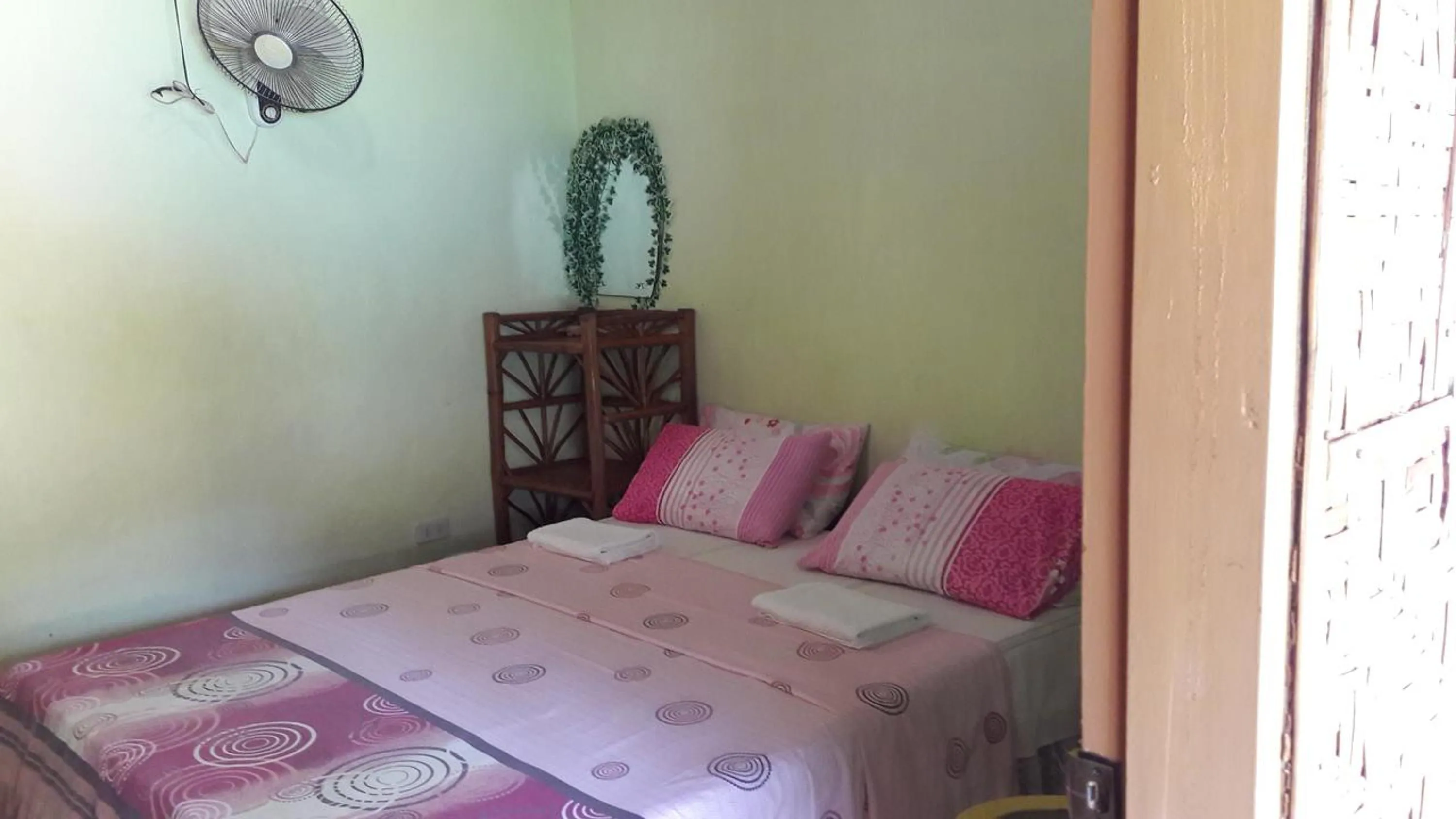 Bedroom, Bed in Bohol Sea Breeze Cottages and Resort