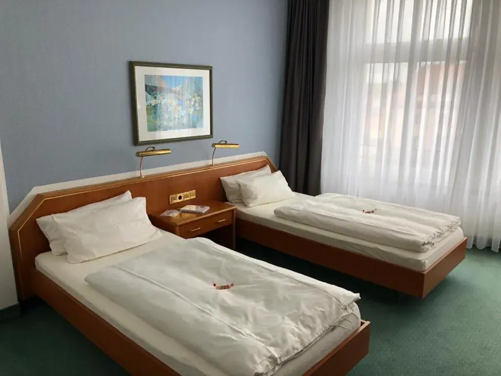 Bed in Hotel Kaiserhof