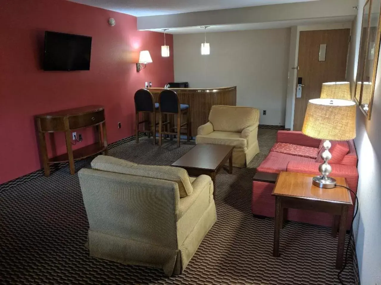Living room, Seating Area in Ramada by Wyndham Raleigh