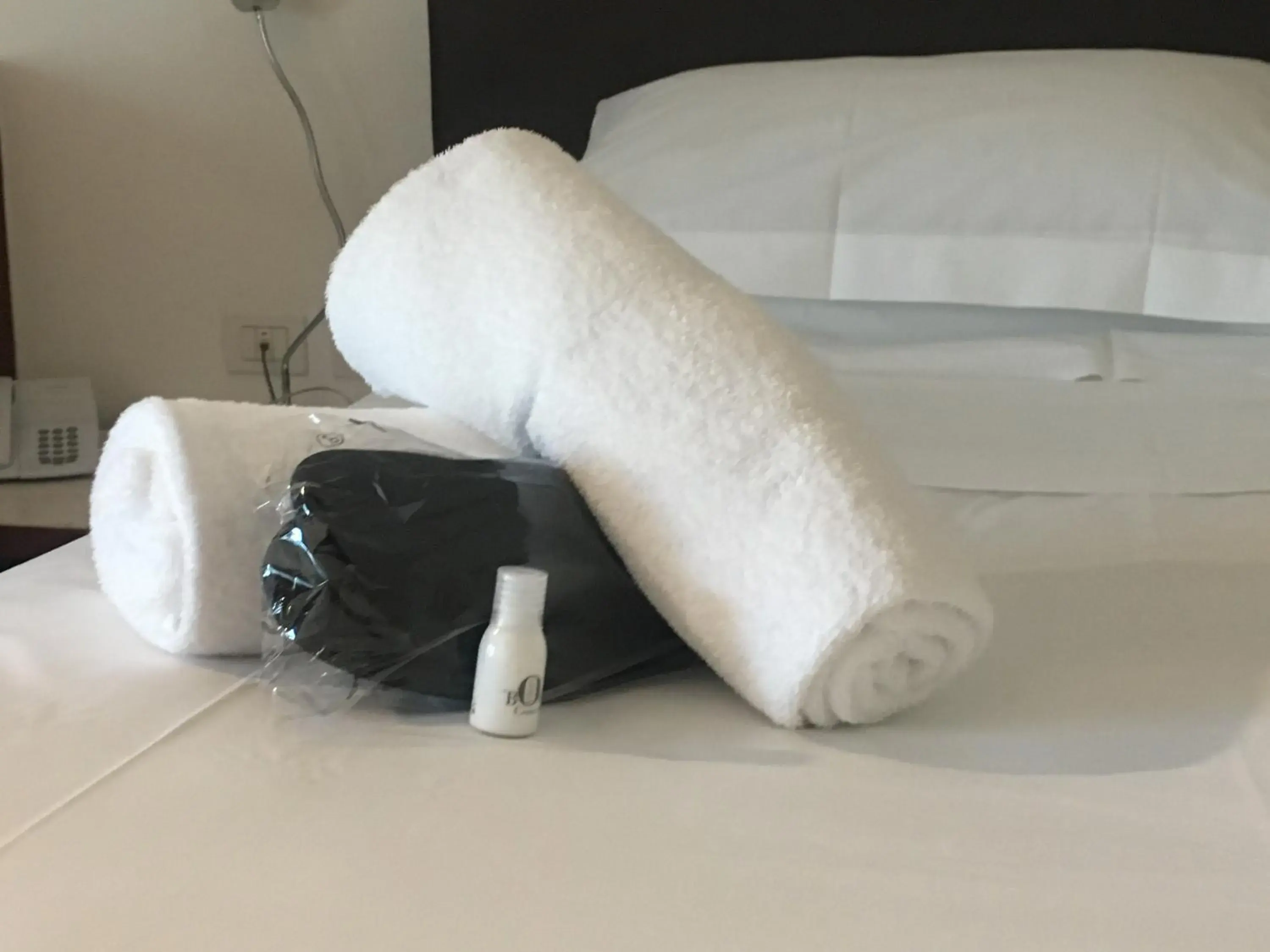 Bed, Bathroom in Black Hotel