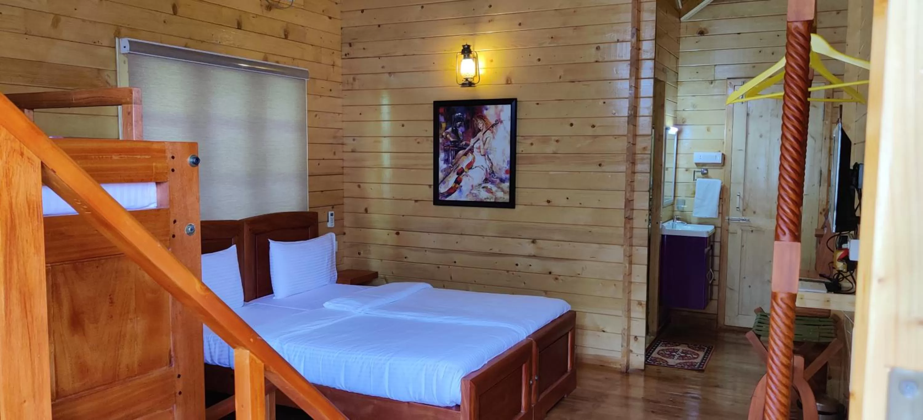 Bed in Woodrose Resort