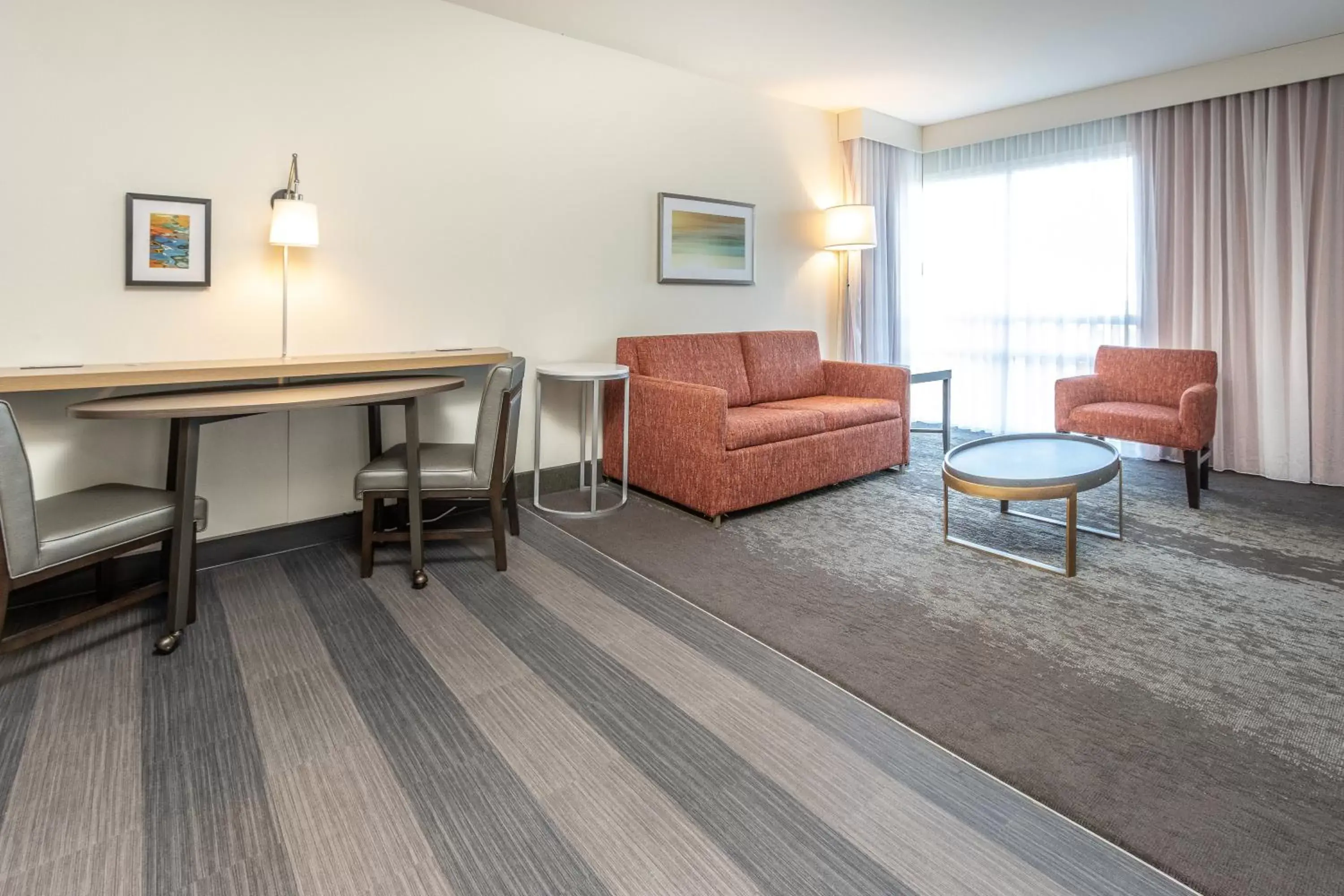 Photo of the whole room, Seating Area in Holiday Inn Hotel & Suites Memphis-Wolfchase Galleria, an IHG Hotel