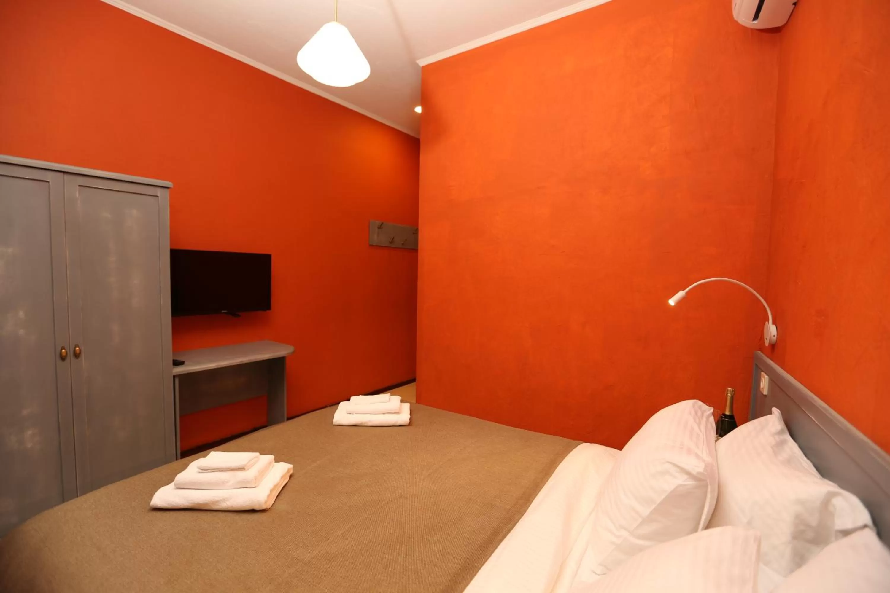 Bed in Kindli Boutique Hotel