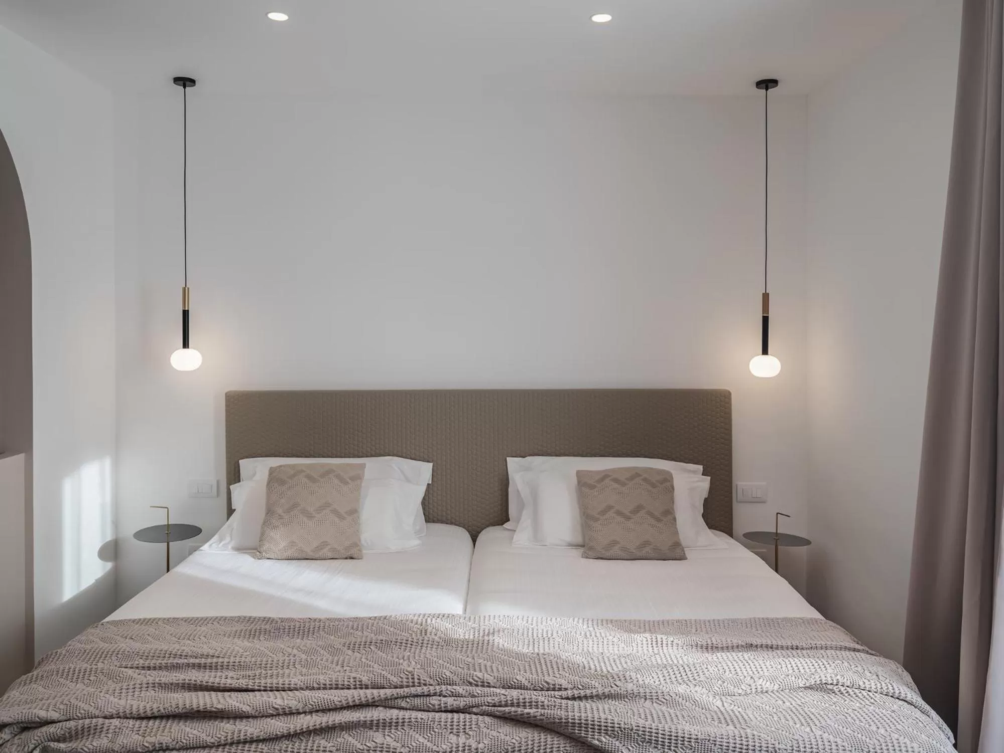 Bed in Living u HomeSuites