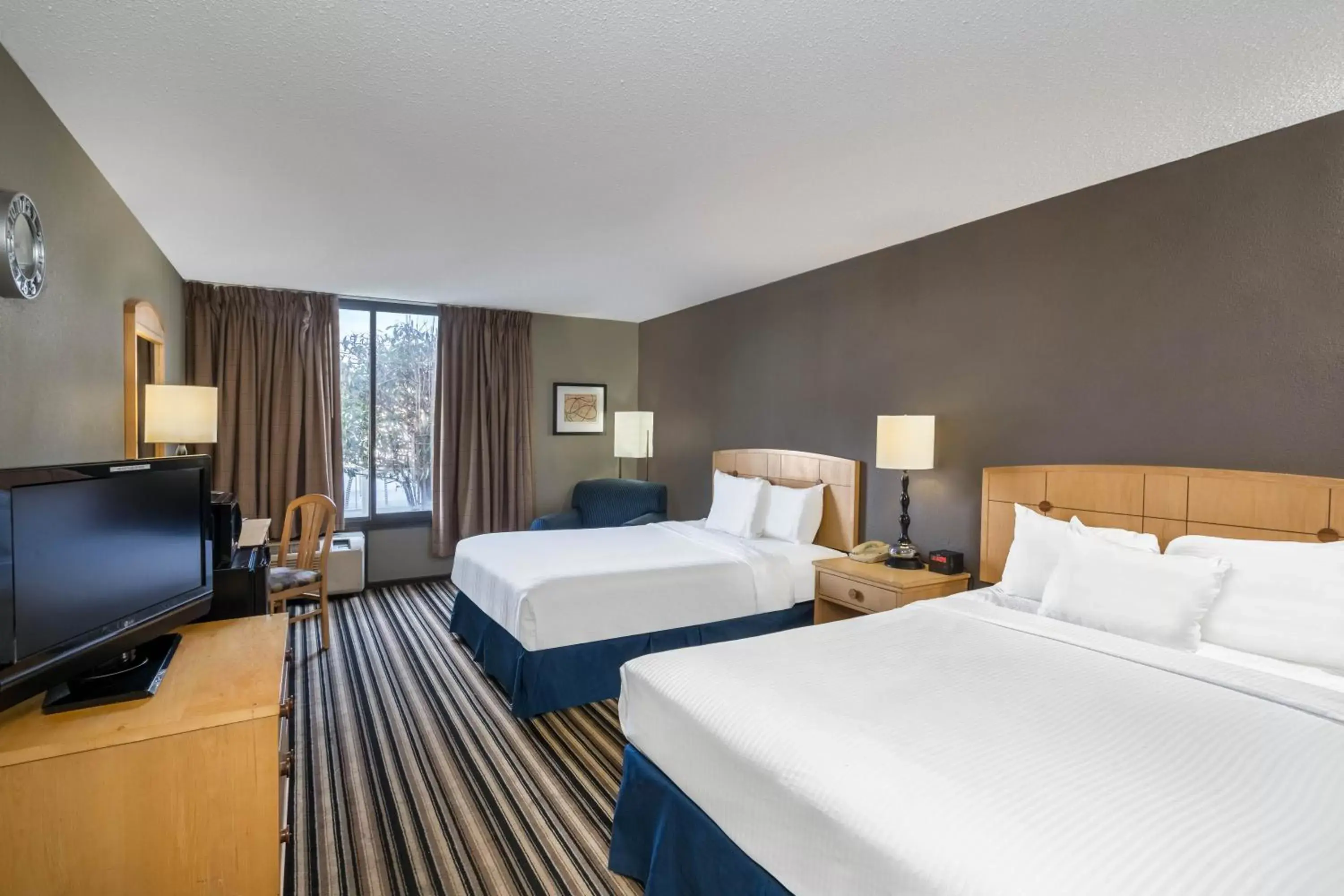 Photo of the whole room, Bed in Travelodge by Wyndham Memphis Airport/Graceland