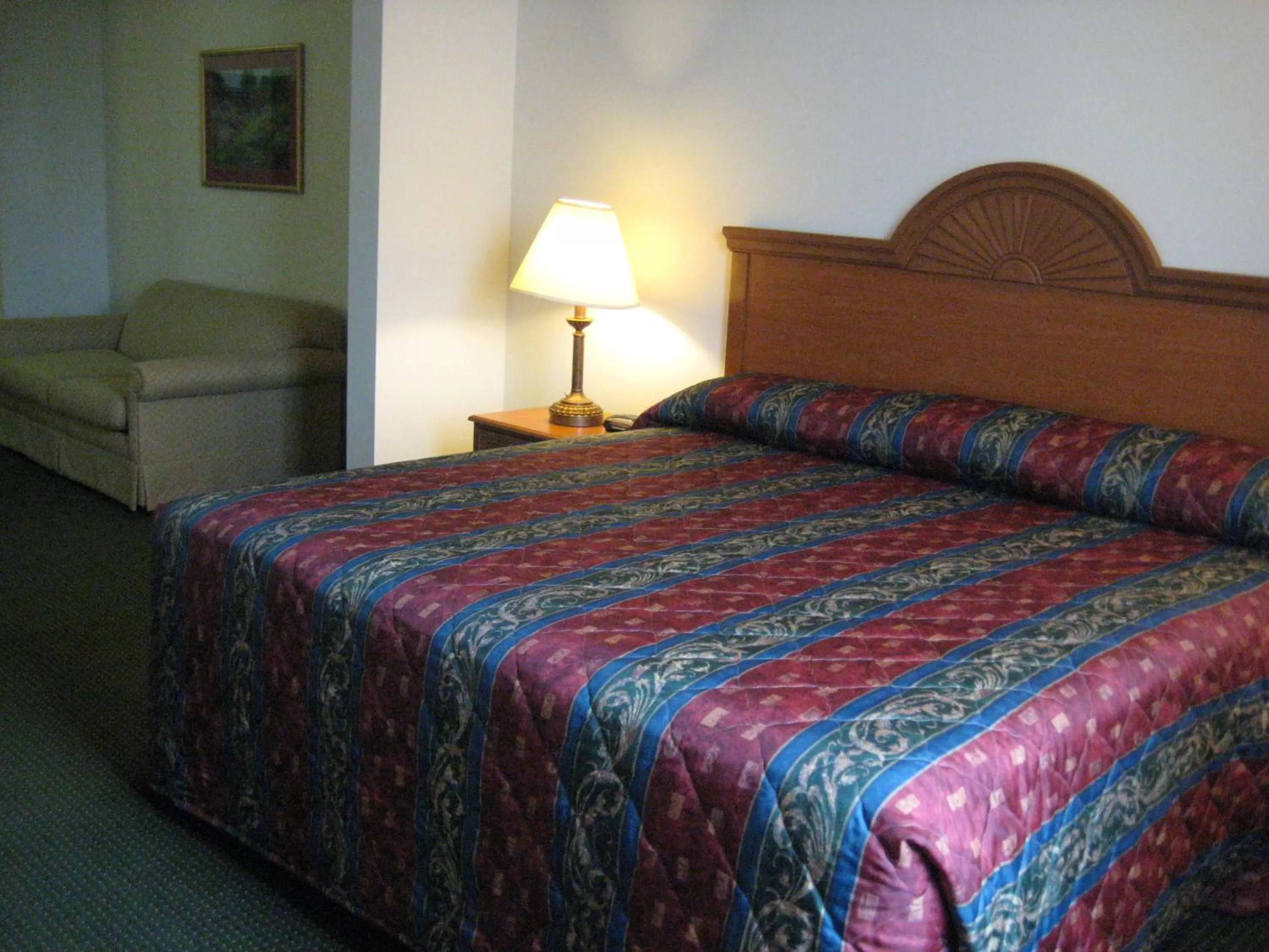 Bed in Horizon Inn & Suites