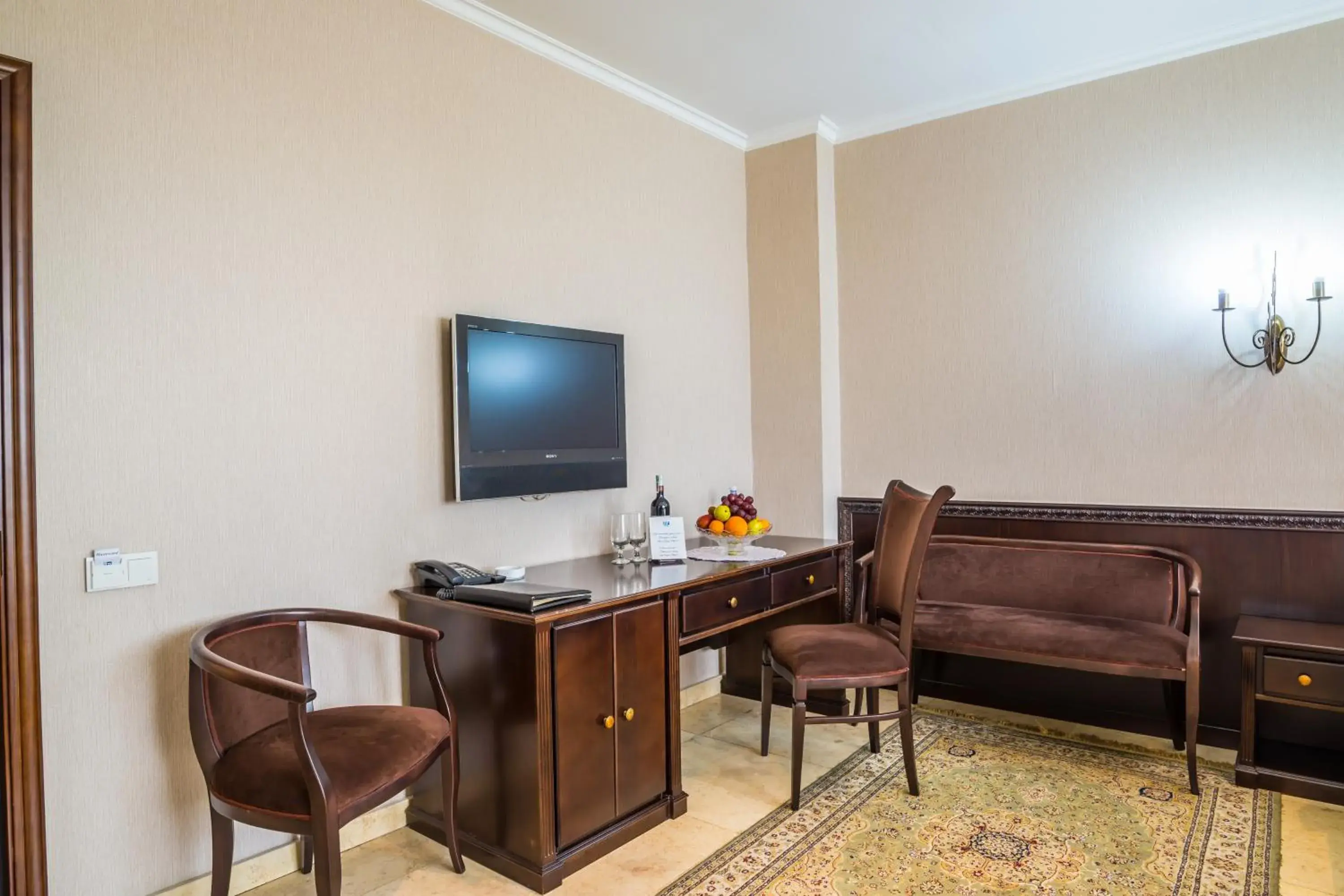 Photo of the whole room, TV/Entertainment Center in Royal Petrol Hotel