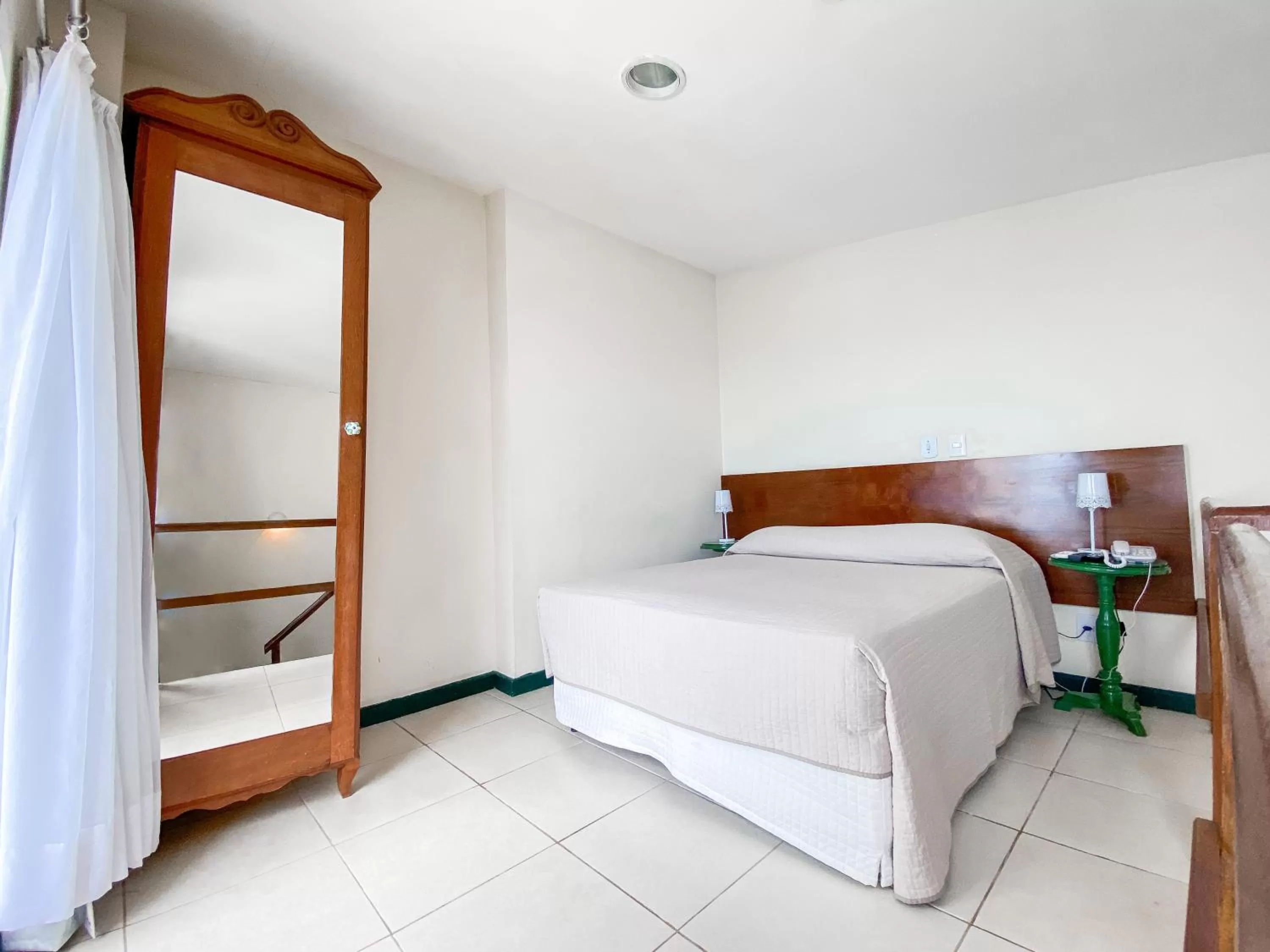 Bed in Pousada Colonial Chile