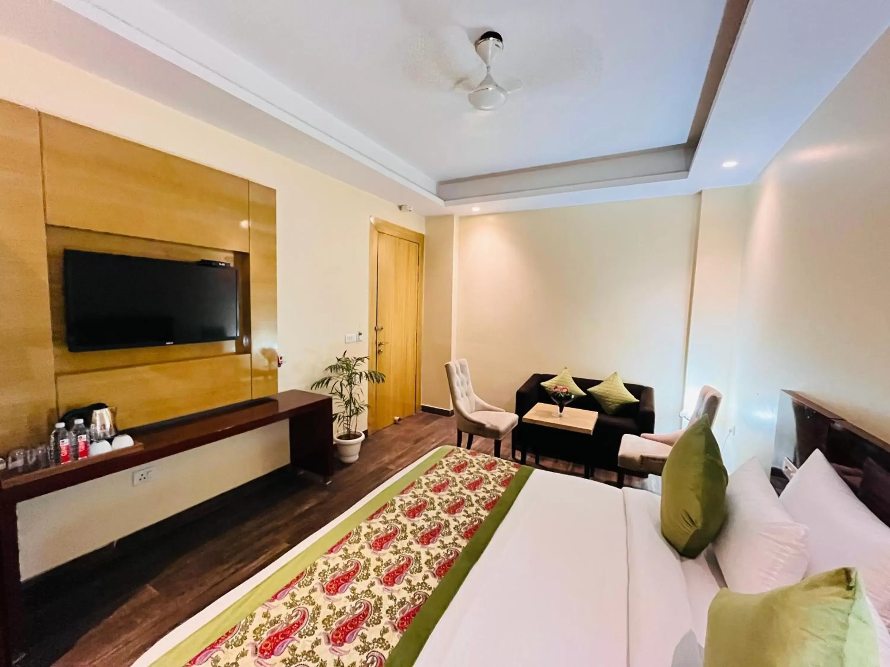 Bed, Seating Area in Hotel Banz - Near Delhi International Airport