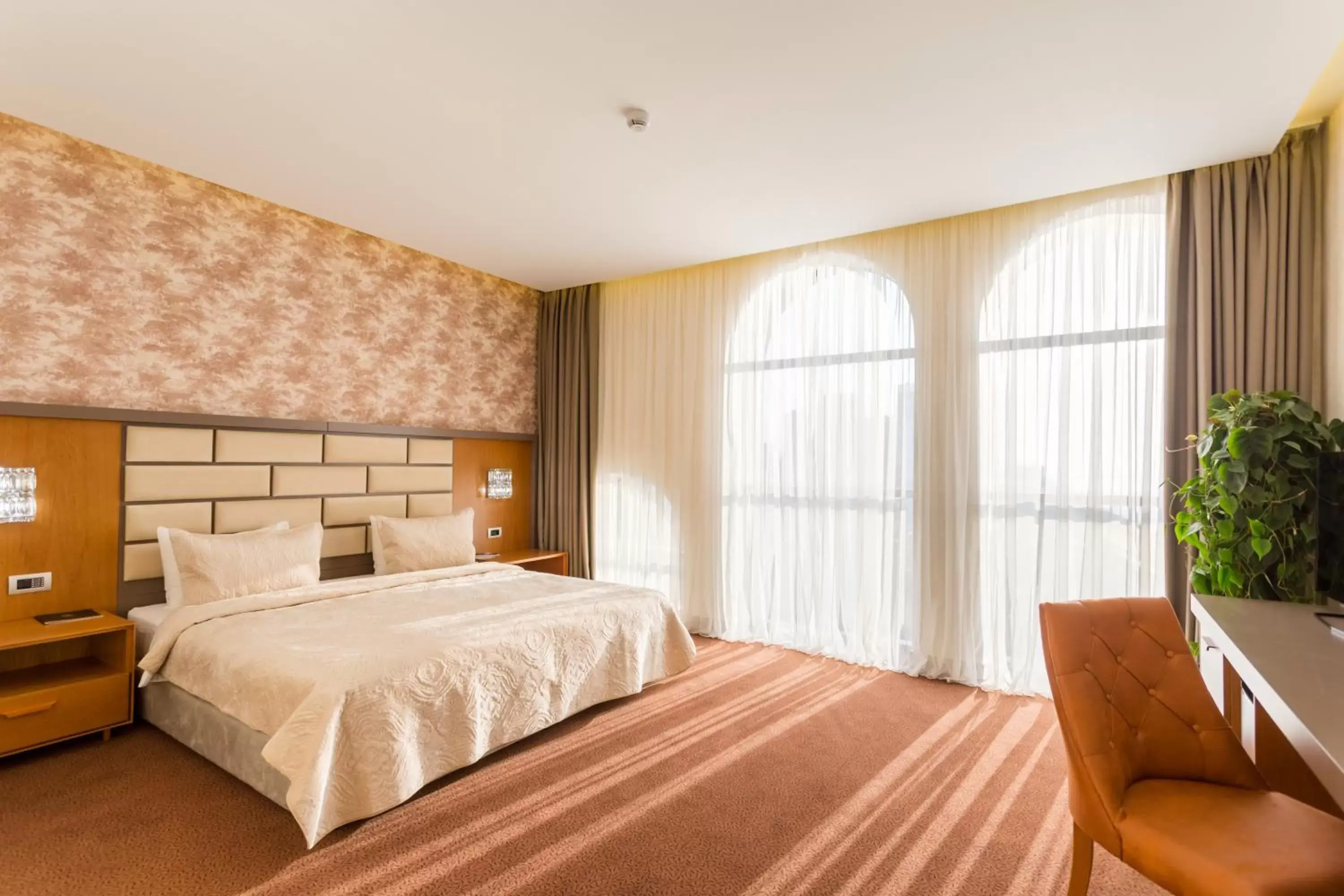 Bed in The Grand Gloria Hotel Bed in The Grand Gloria Hotel