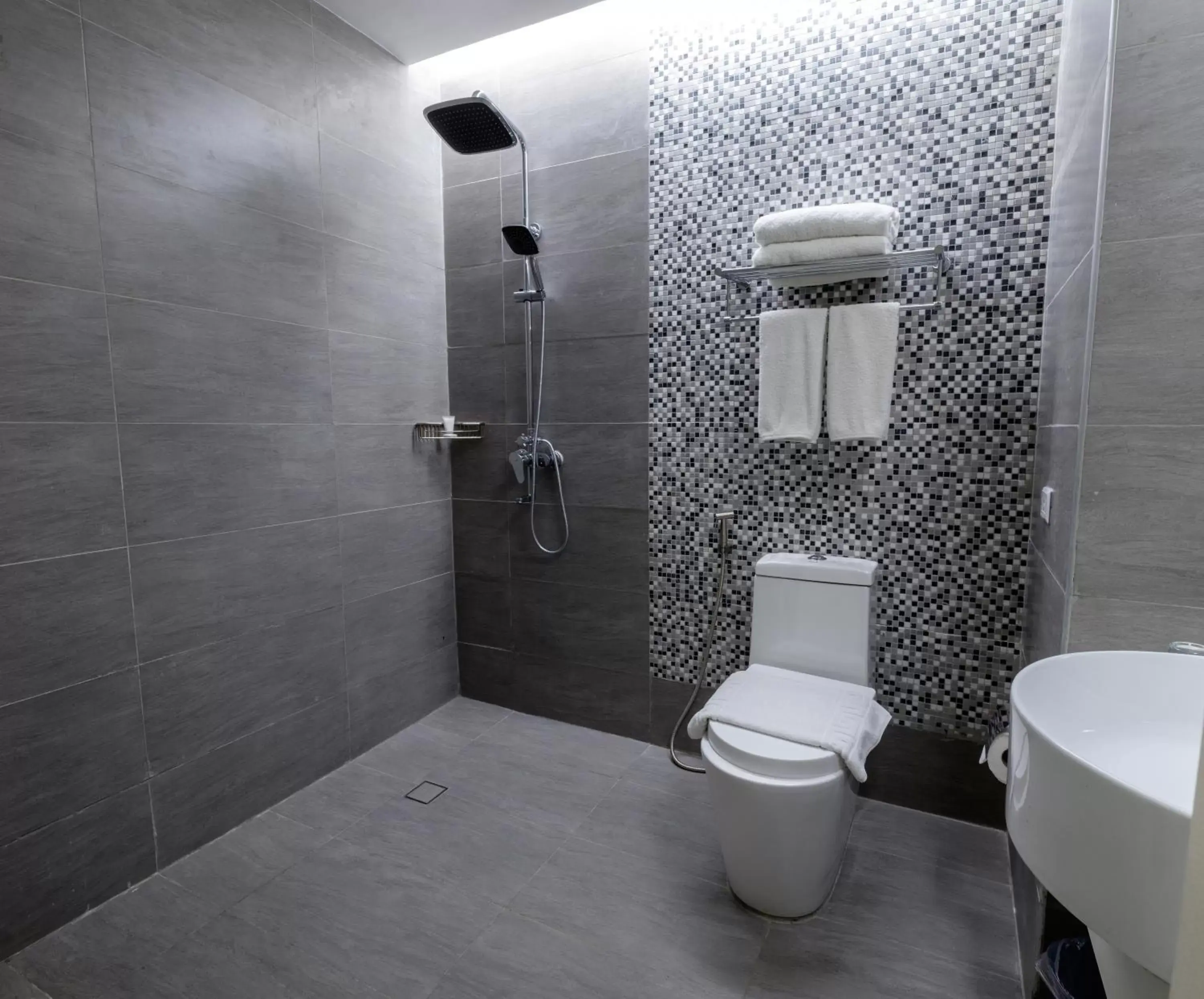 Shower, Bathroom in One Central Hotel & Suites