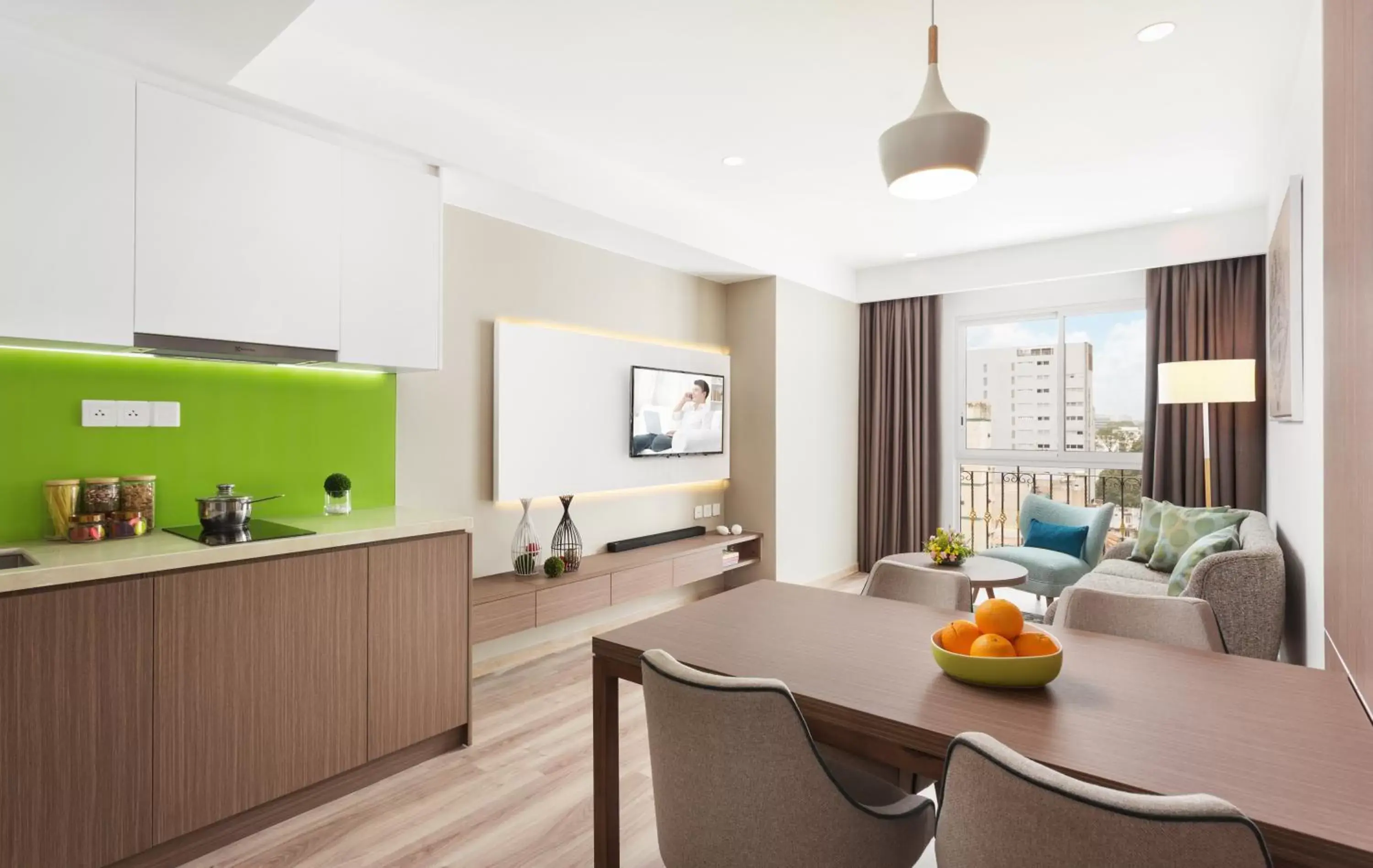 Living room, Kitchen/Kitchenette in Citadines Regency Saigon