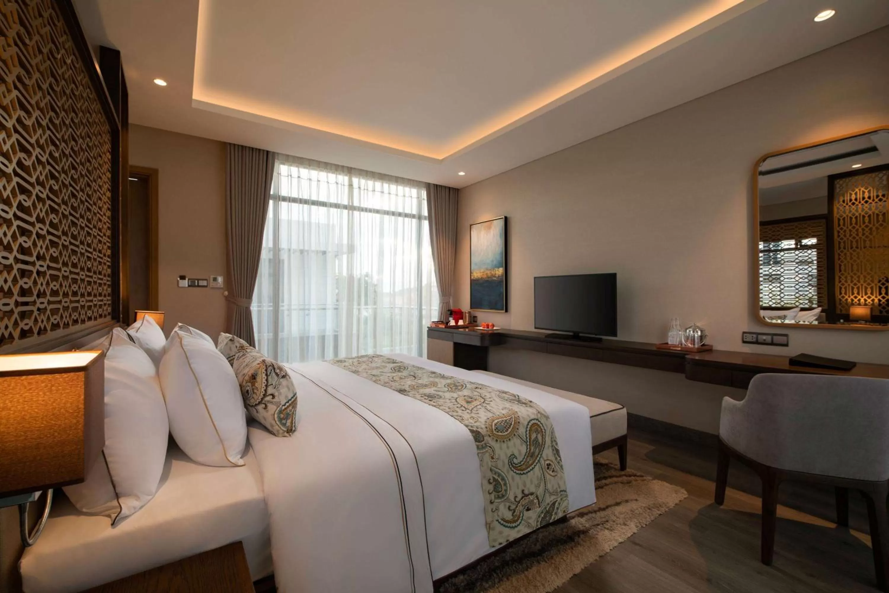 Photo of the whole room, Bed in Wyndham Grand KN Paradise Cam Ranh