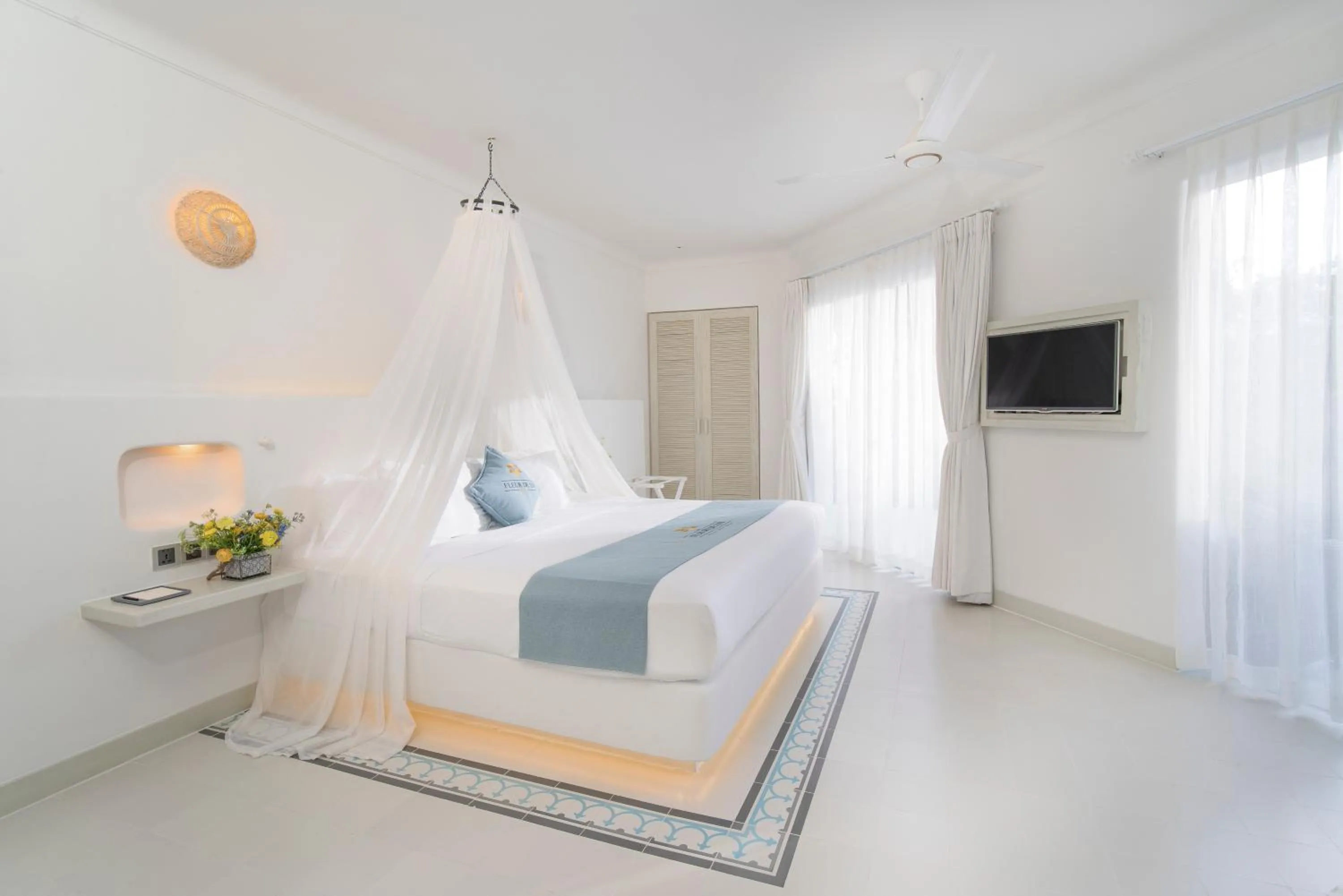 Photo of the whole room, Bed in Fleur de Lys Resort & Spa Long Hai