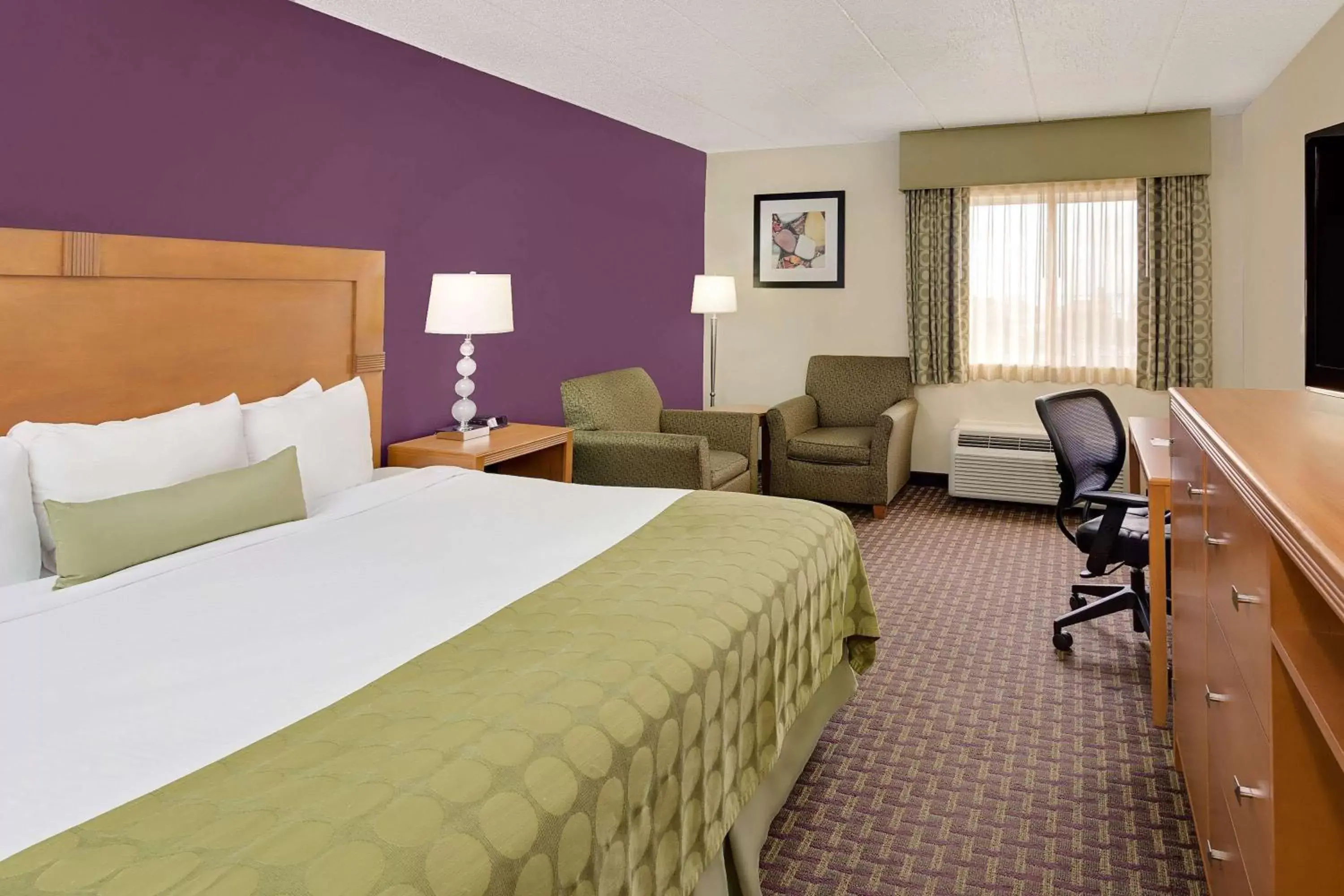 Photo of the whole room, Bed in Ramada by Wyndham Marquette