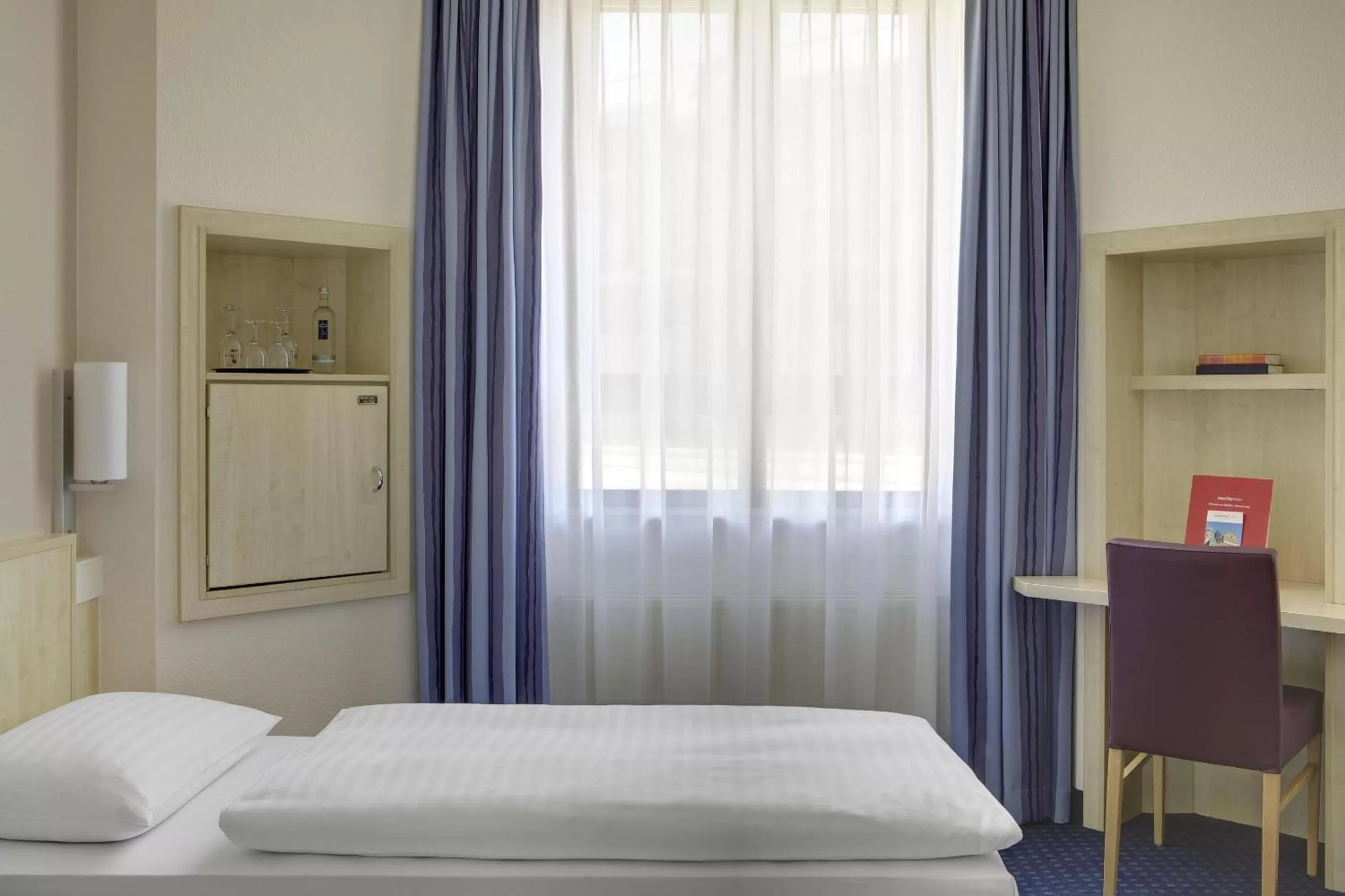 Bed in IntercityHotel Kassel