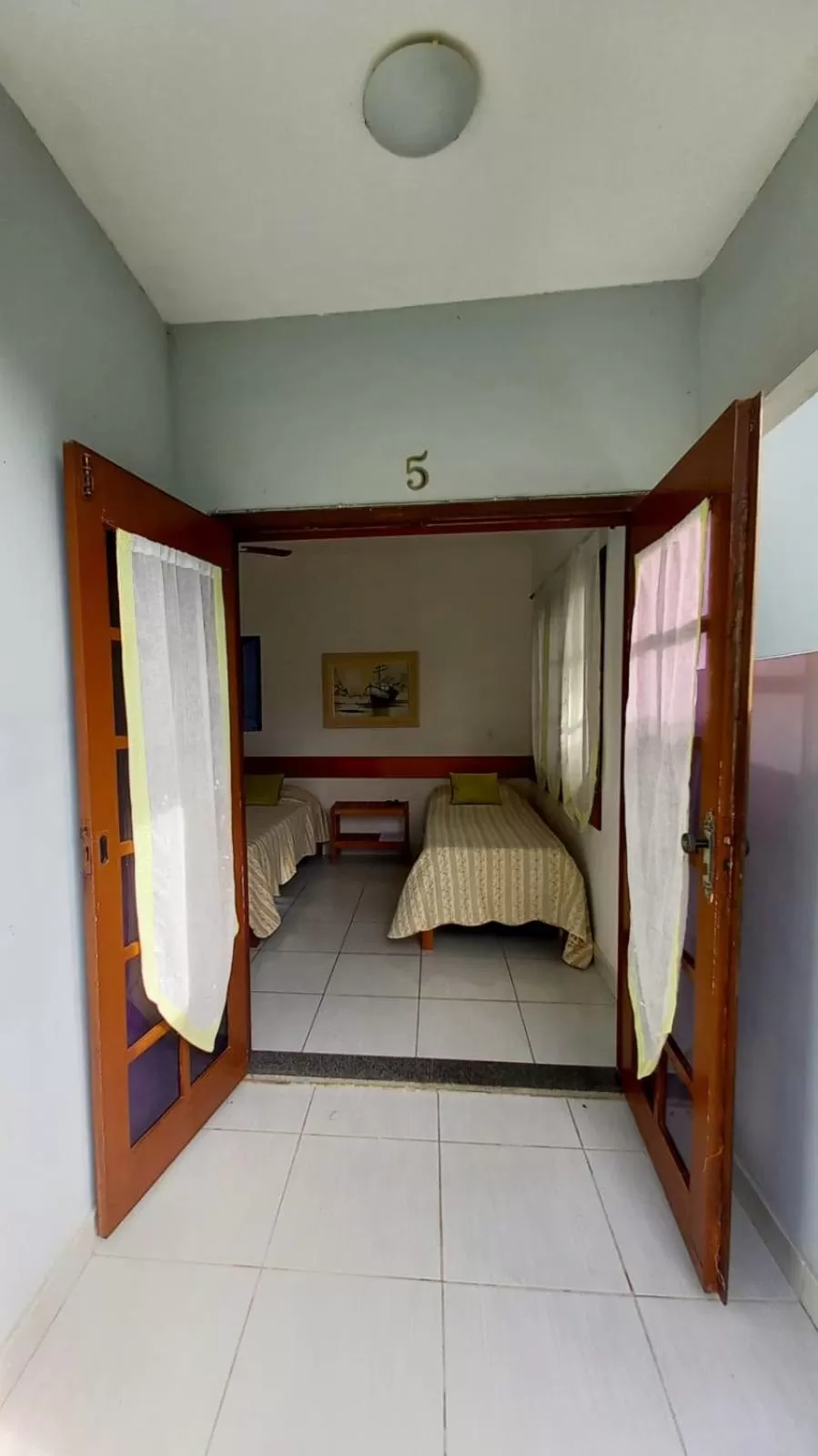 Bed in Pousada Recanto Das Emerências