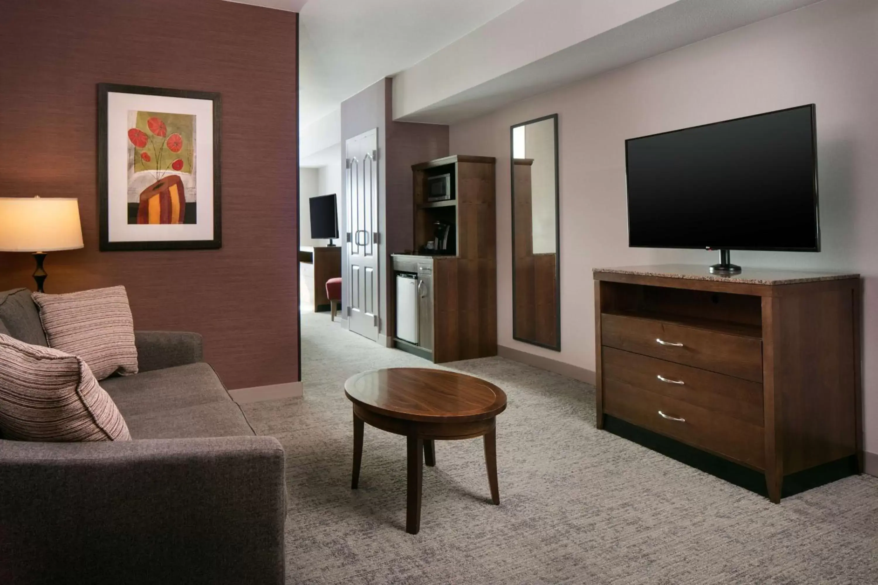 Living room, TV/Entertainment Center in Hilton Garden Inn Manhattan Kansas