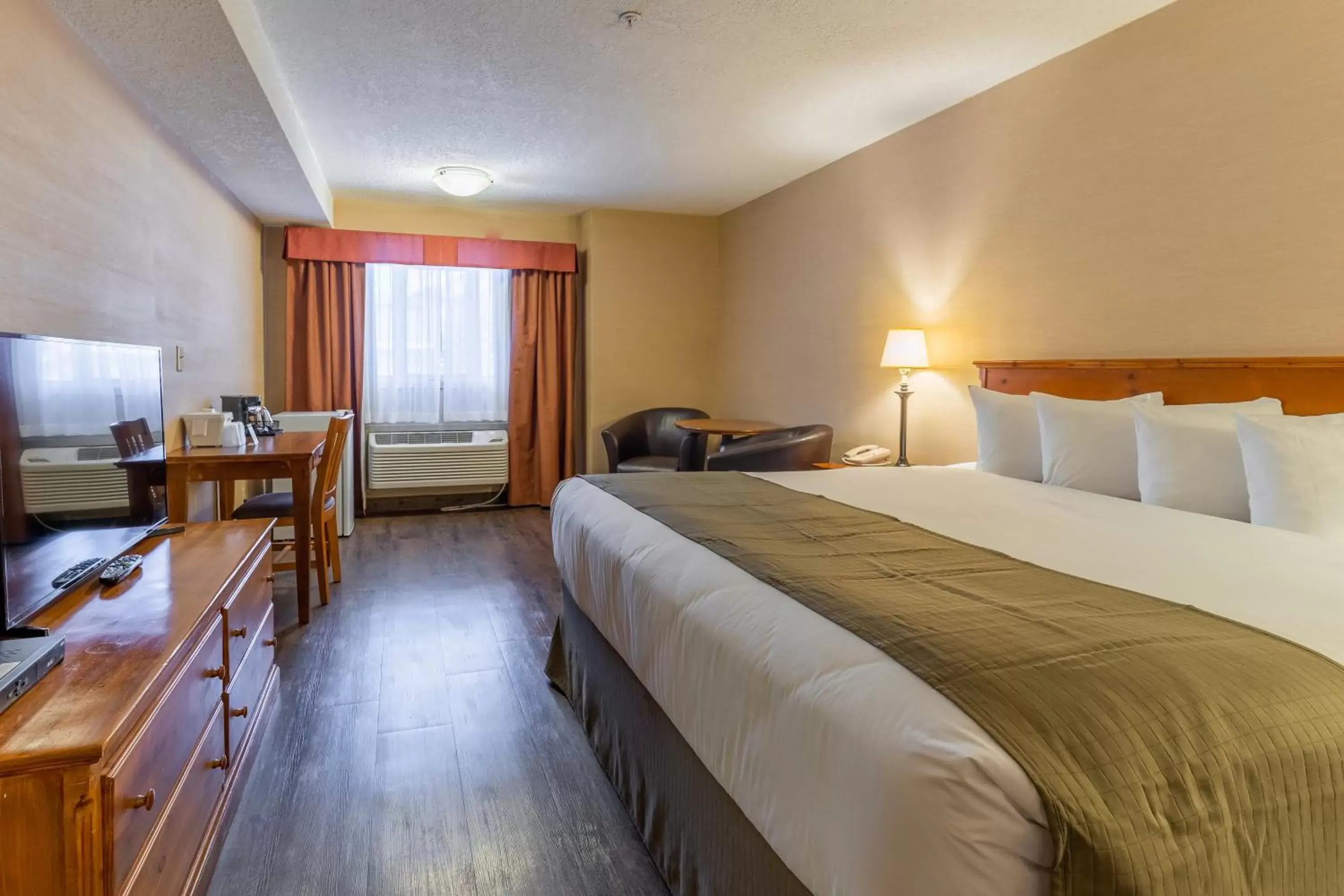 Bedroom in Canmore Inn & Suites