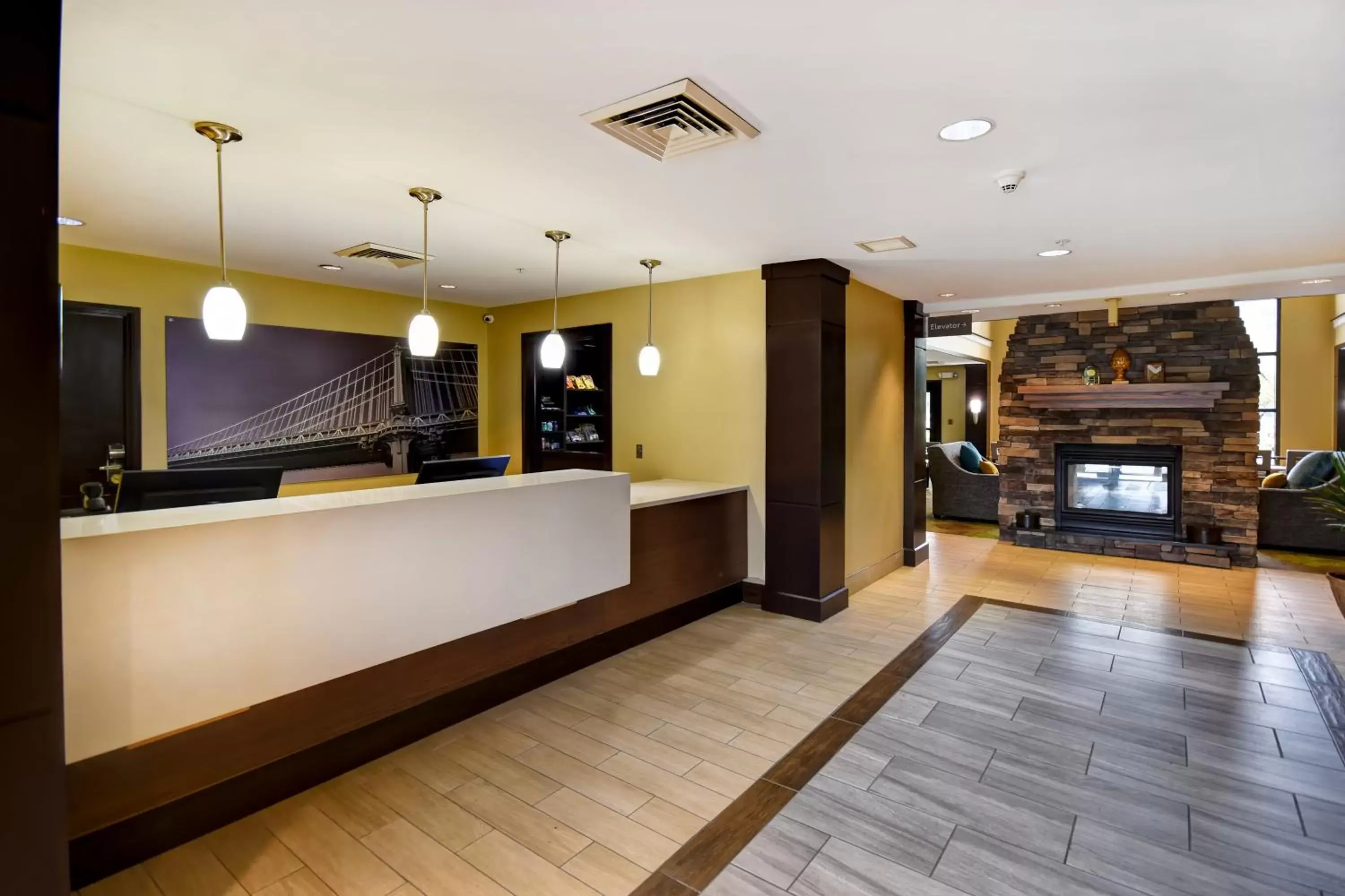 Property building, Lobby/Reception in Staybridge Suites Grand Rapids-Kentwood, an IHG Hotel