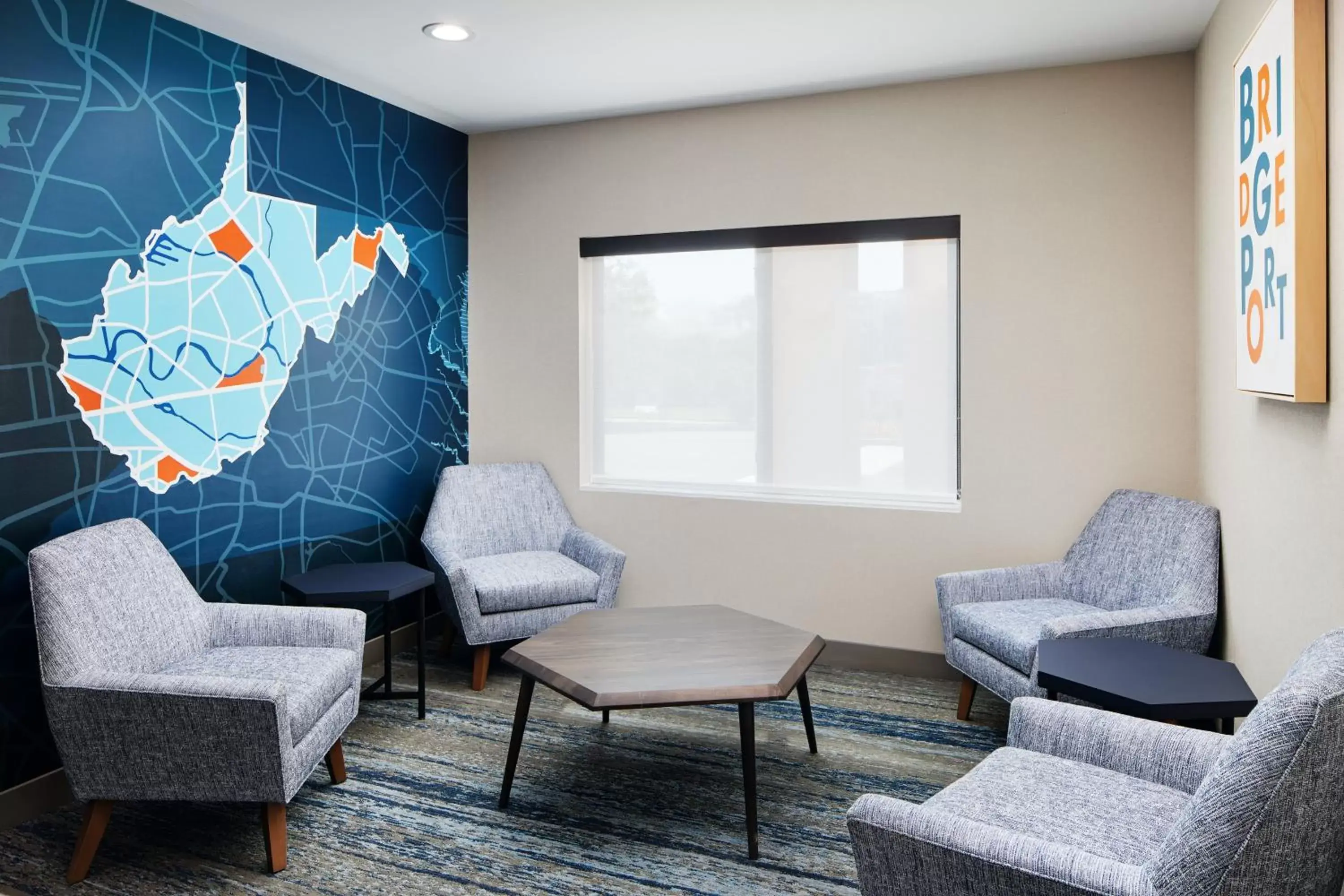 Lobby or reception, Seating Area in Holiday Inn Express and Suites Wheeling, an IHG Hotel