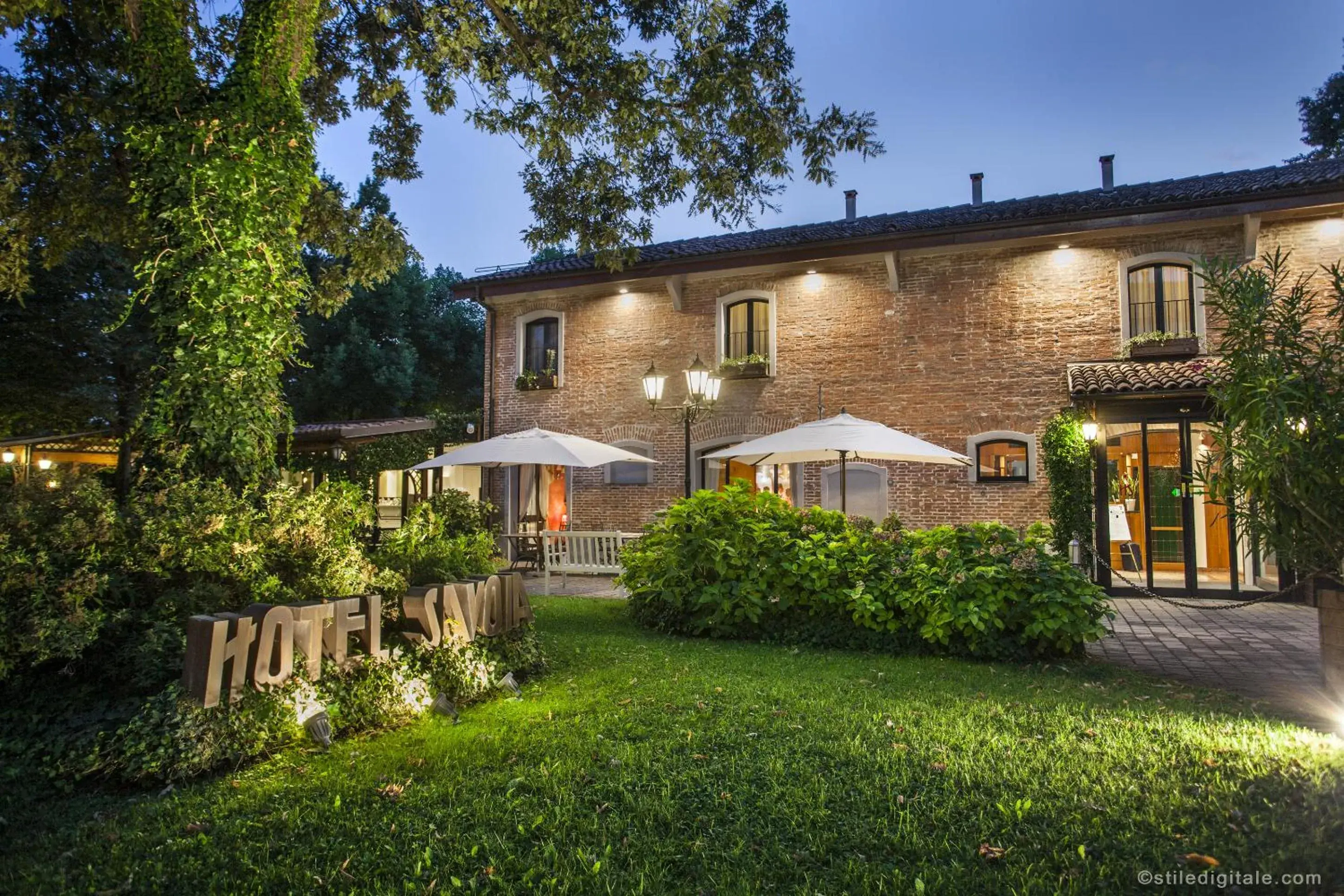 Garden view, Property Building in Savoia Hotel Country House Bologna