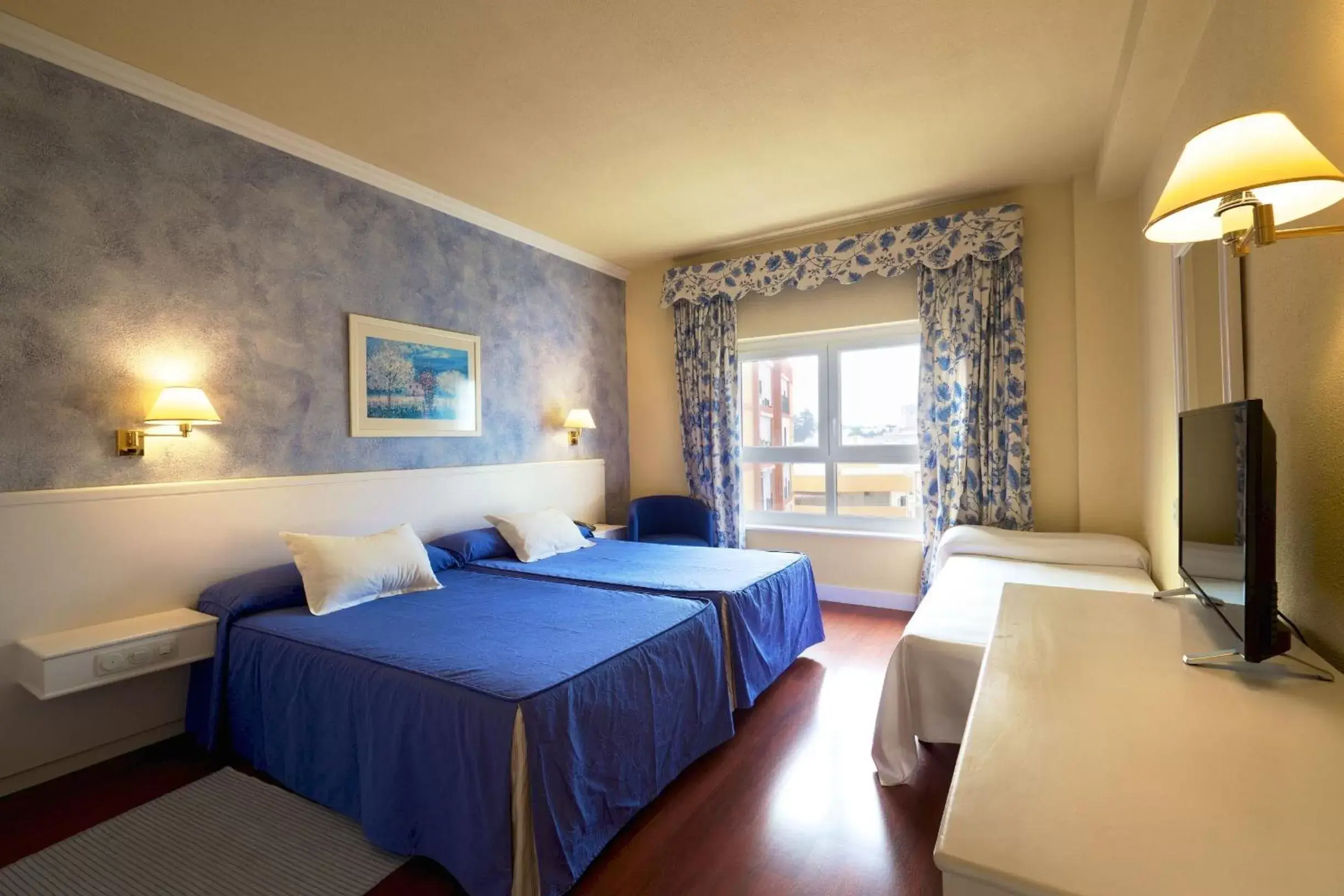 Bed in Hotel Guadalquivir
