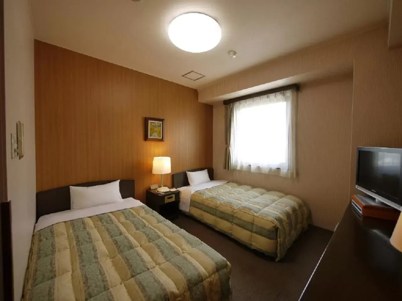 Bed in Hotel Route-Inn Court Minami Matsumoto