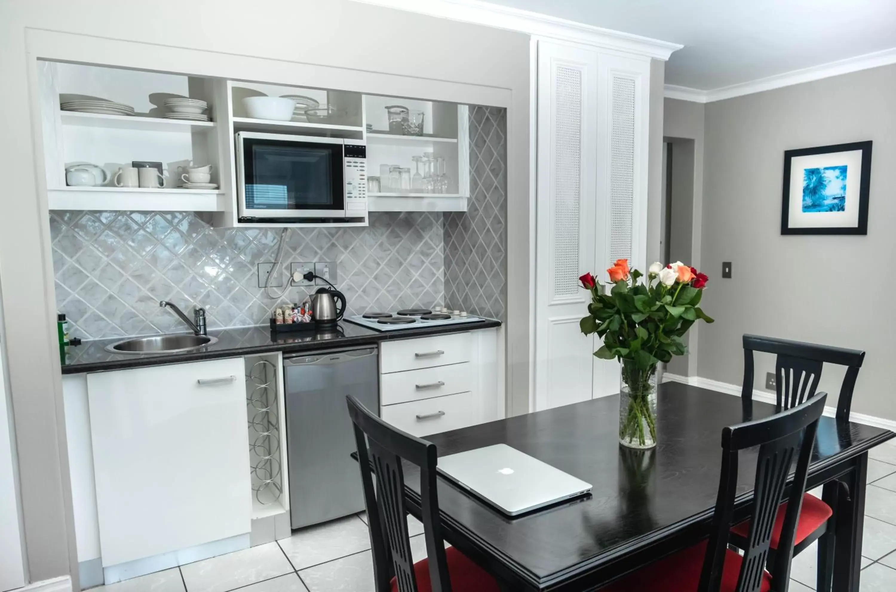 Dining area, Kitchen/Kitchenette in The Bantry Bay Aparthotel by Totalstay