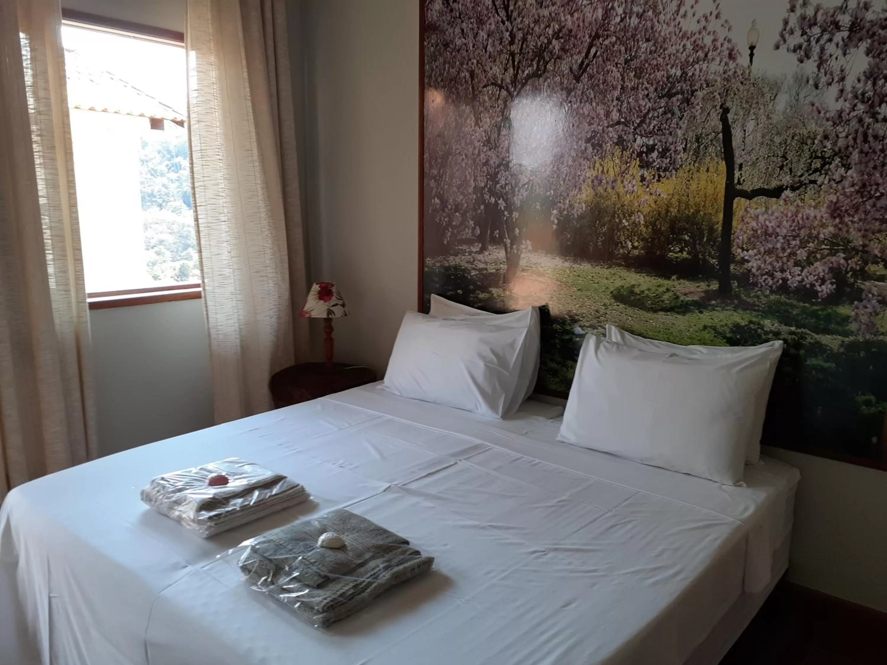 Bed in Pousada R.N.C. Nosso Paraíso