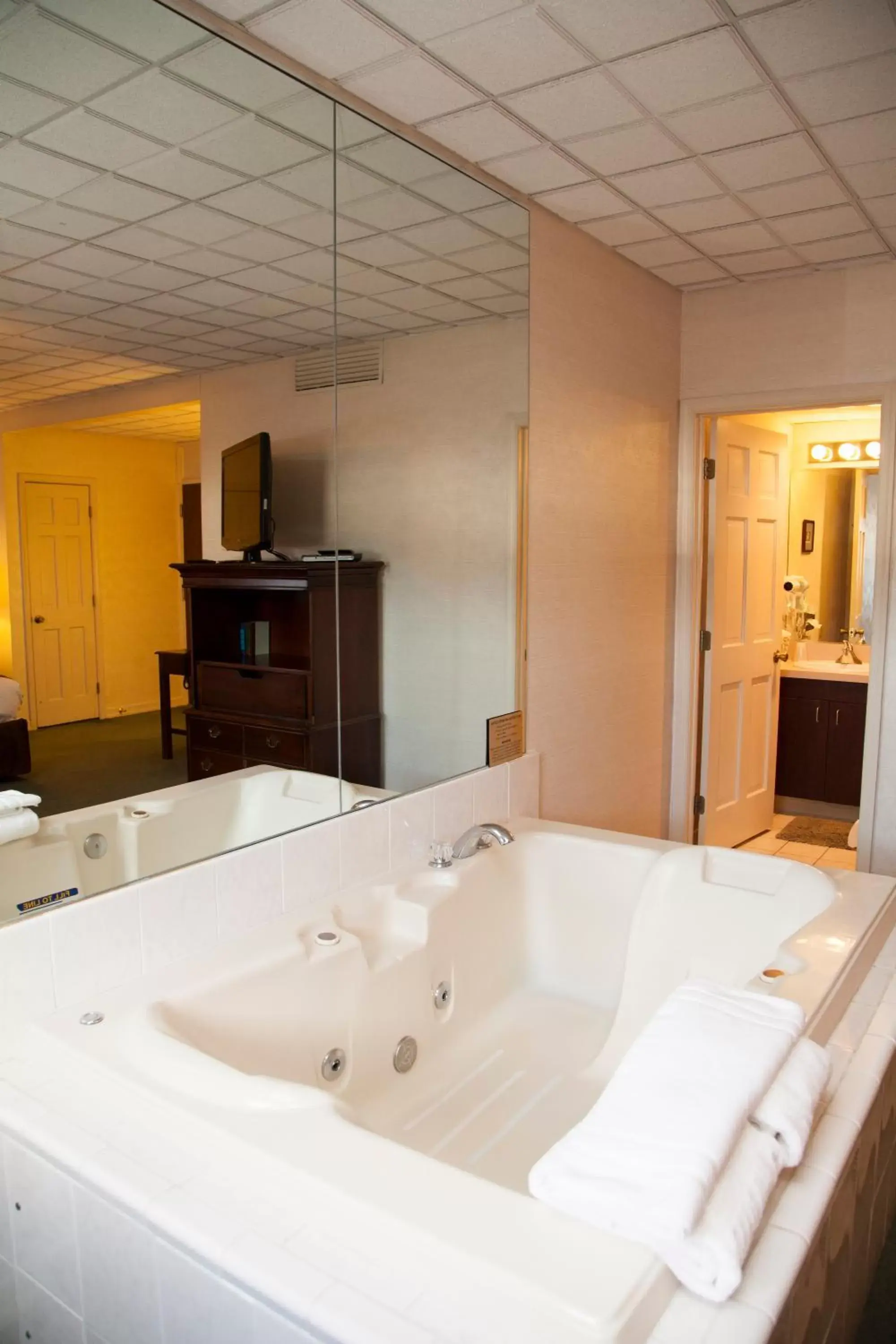 Bathroom in Genetti Hotel, SureStay Collection by Best Western