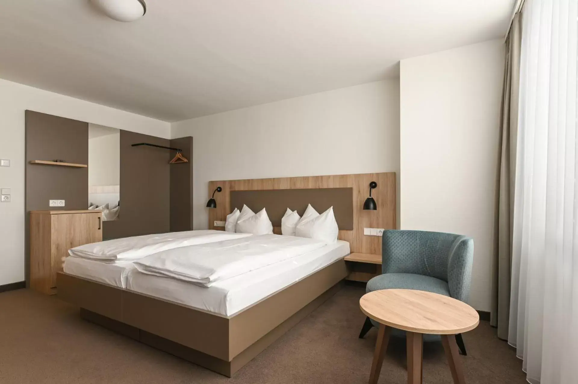 Photo of the whole room, Bed in Landschloss Korntal Photo of the whole room, Bed in Landschloss Korntal