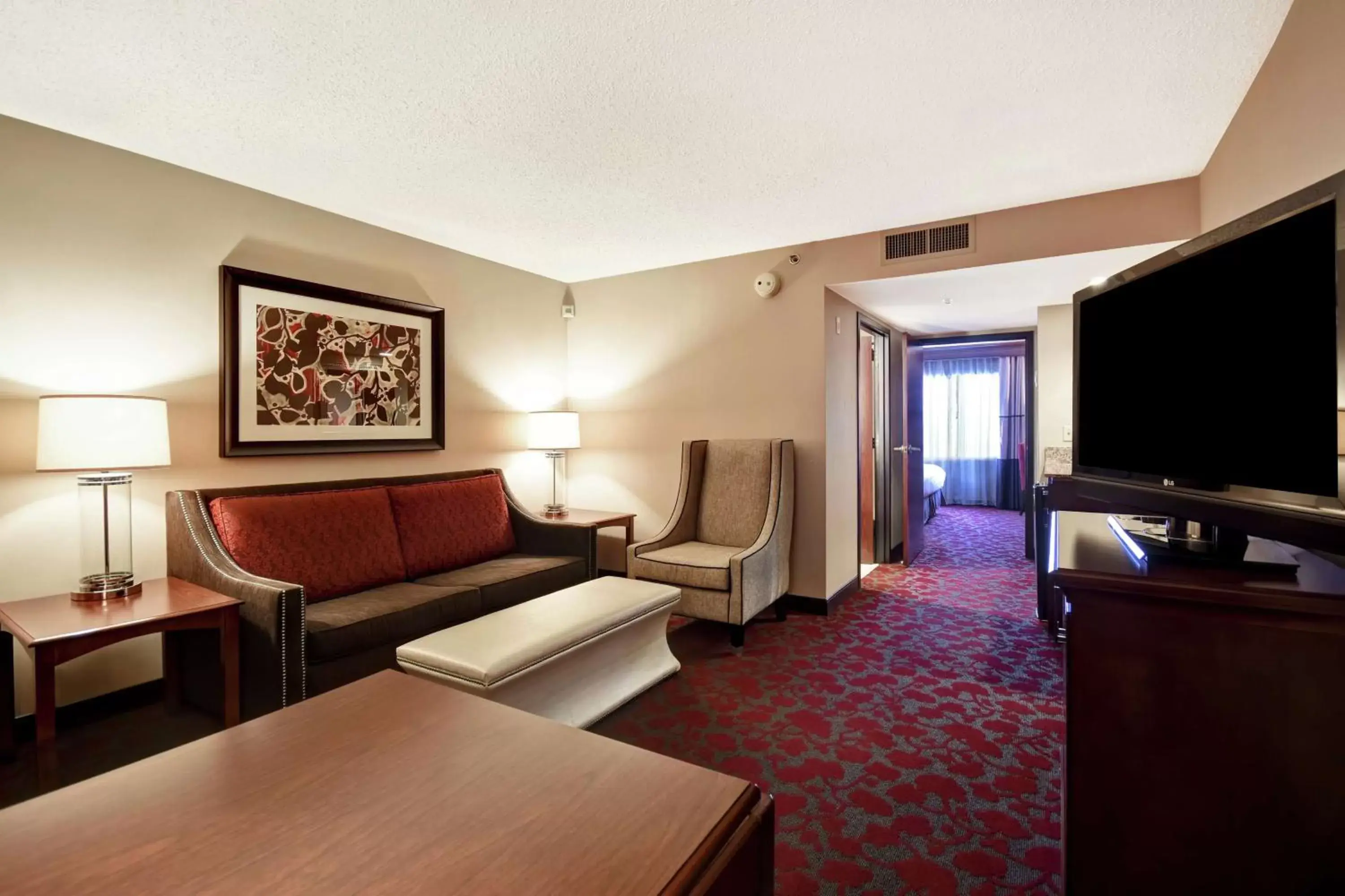 Bedroom, Seating Area in Embassy Suites by Hilton Dulles Airport