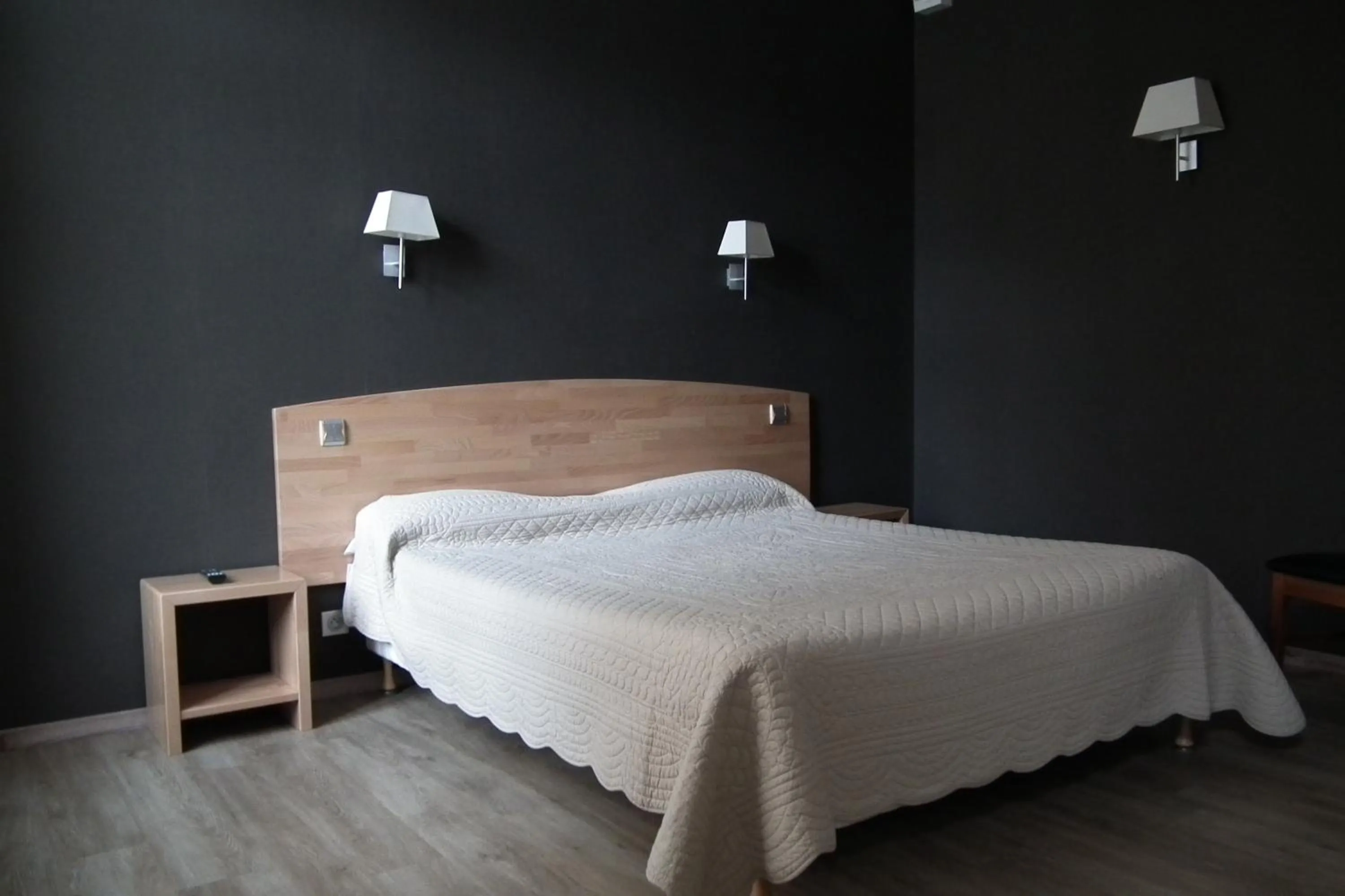 Bed in Hôtel la Guimbarde